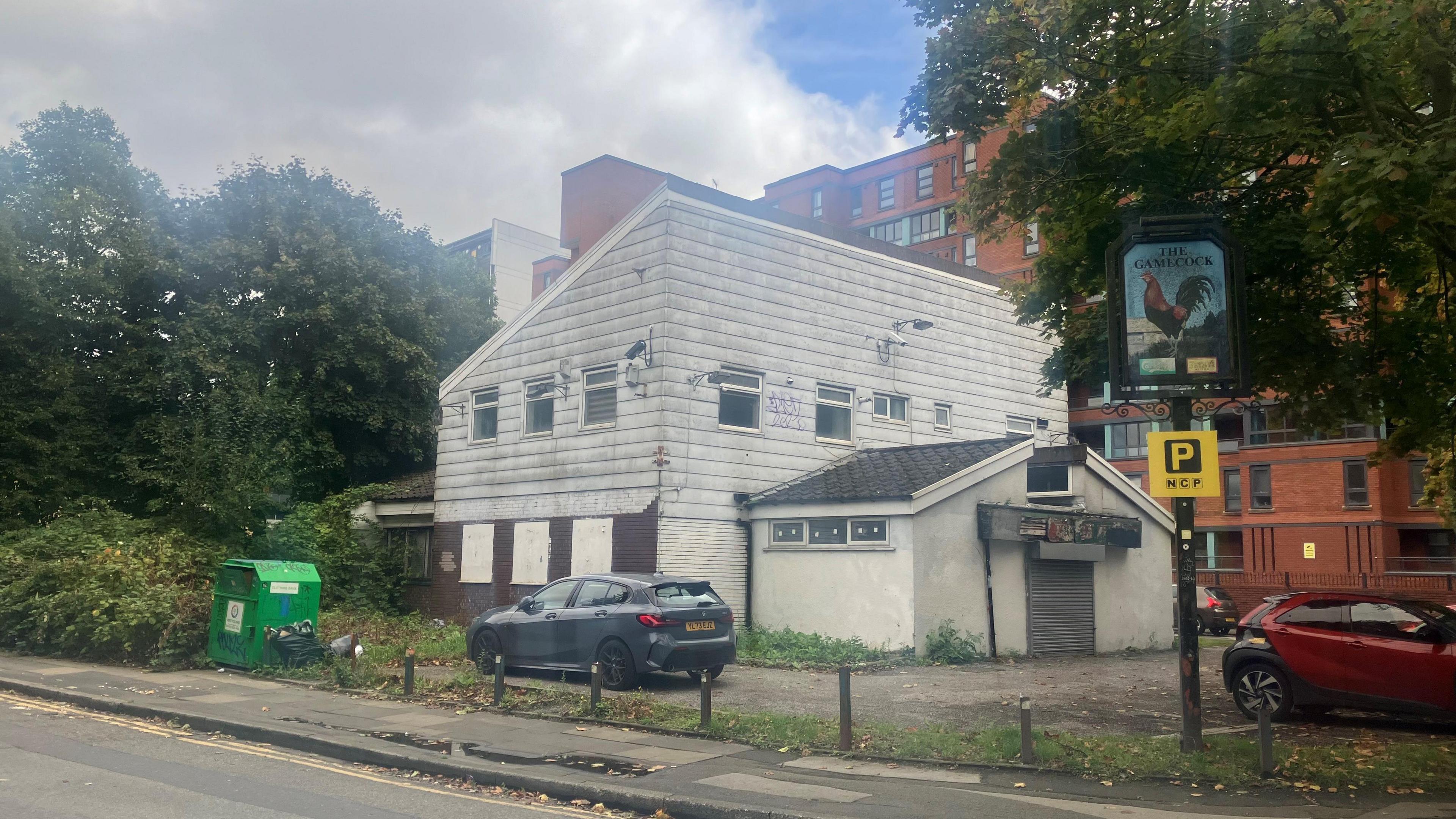 The boarded up Gamecock pub in Hulme close to Manchester city centre.