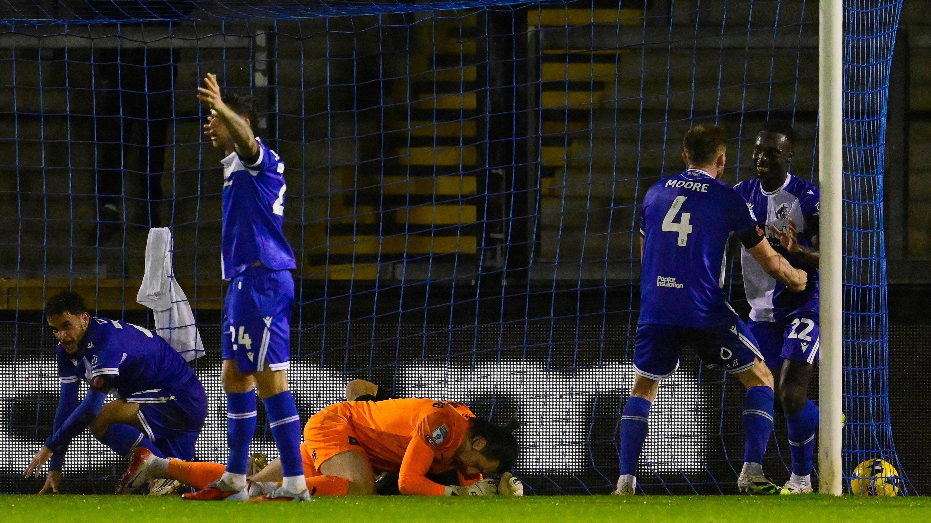 A stoppage-time goalkeeping error sees 10-man Argyle lose 1-0 at Bristol Rovers in the EFL Trophy in their last match