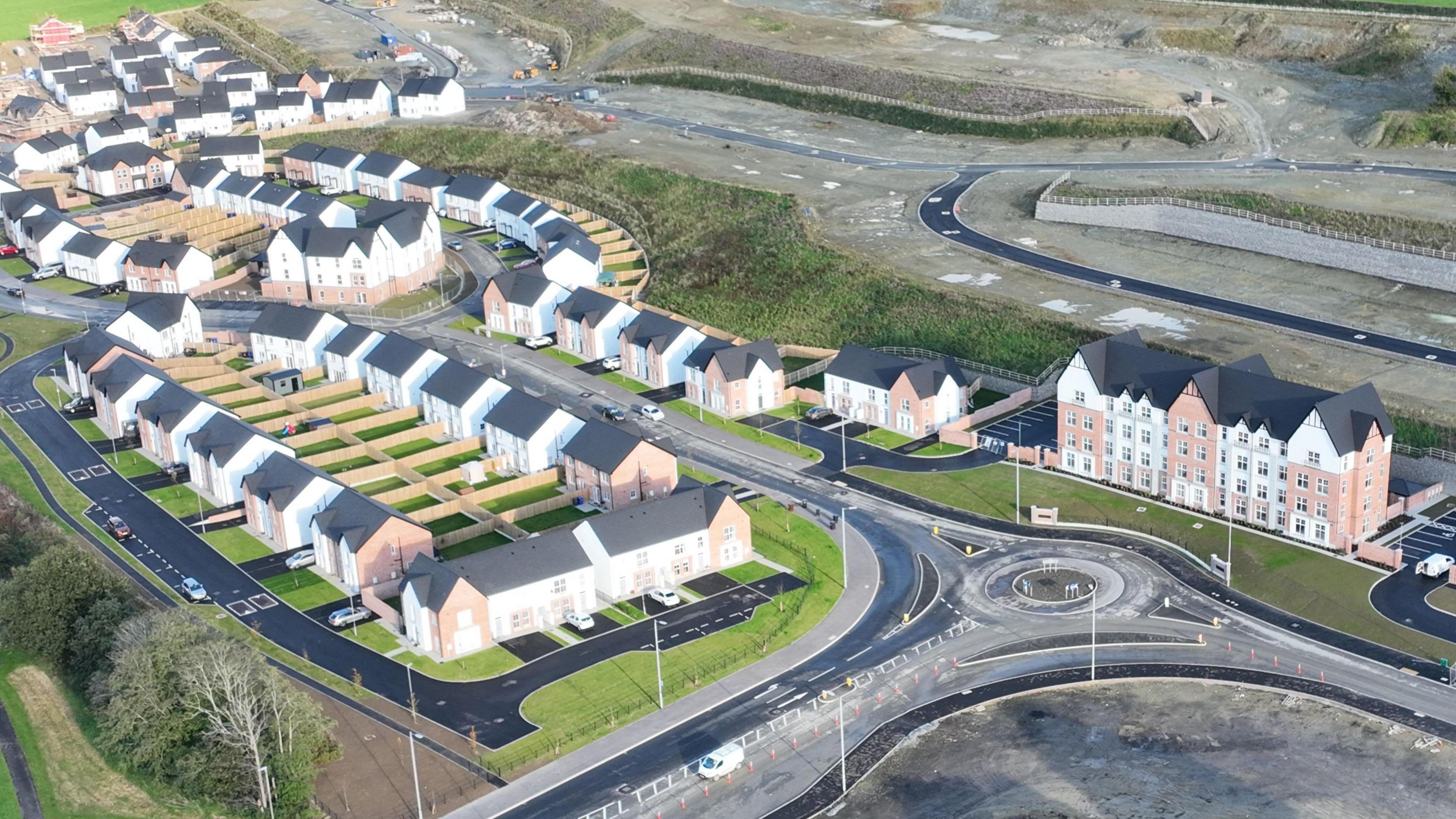 a design drawing of new ghomes close to the foyle bridge in derry