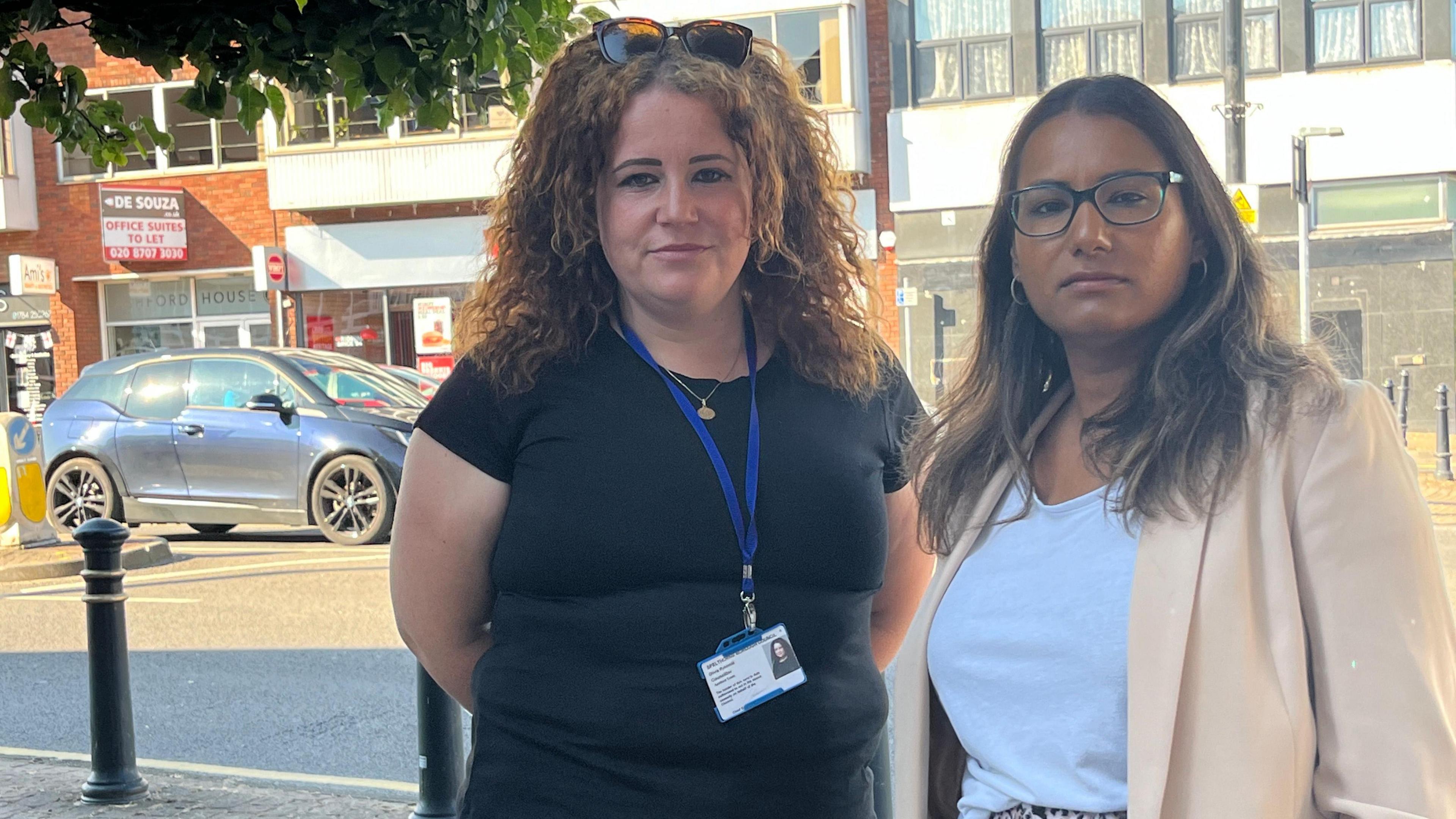 Olivia Rybinski and Sonya Talbutt outside the site of the proposed gambling centre