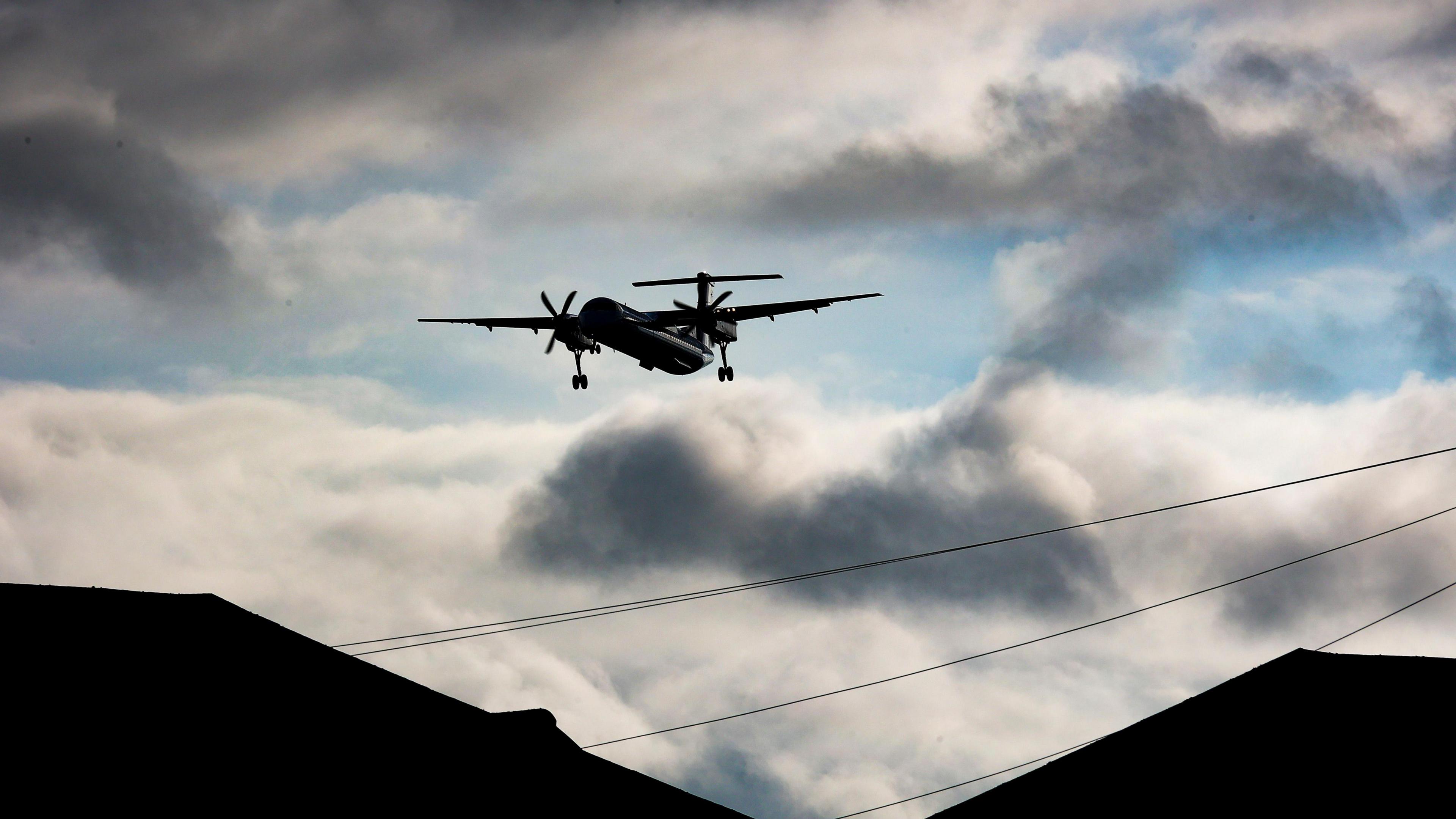 A plane in the skies above Birmingham Airport