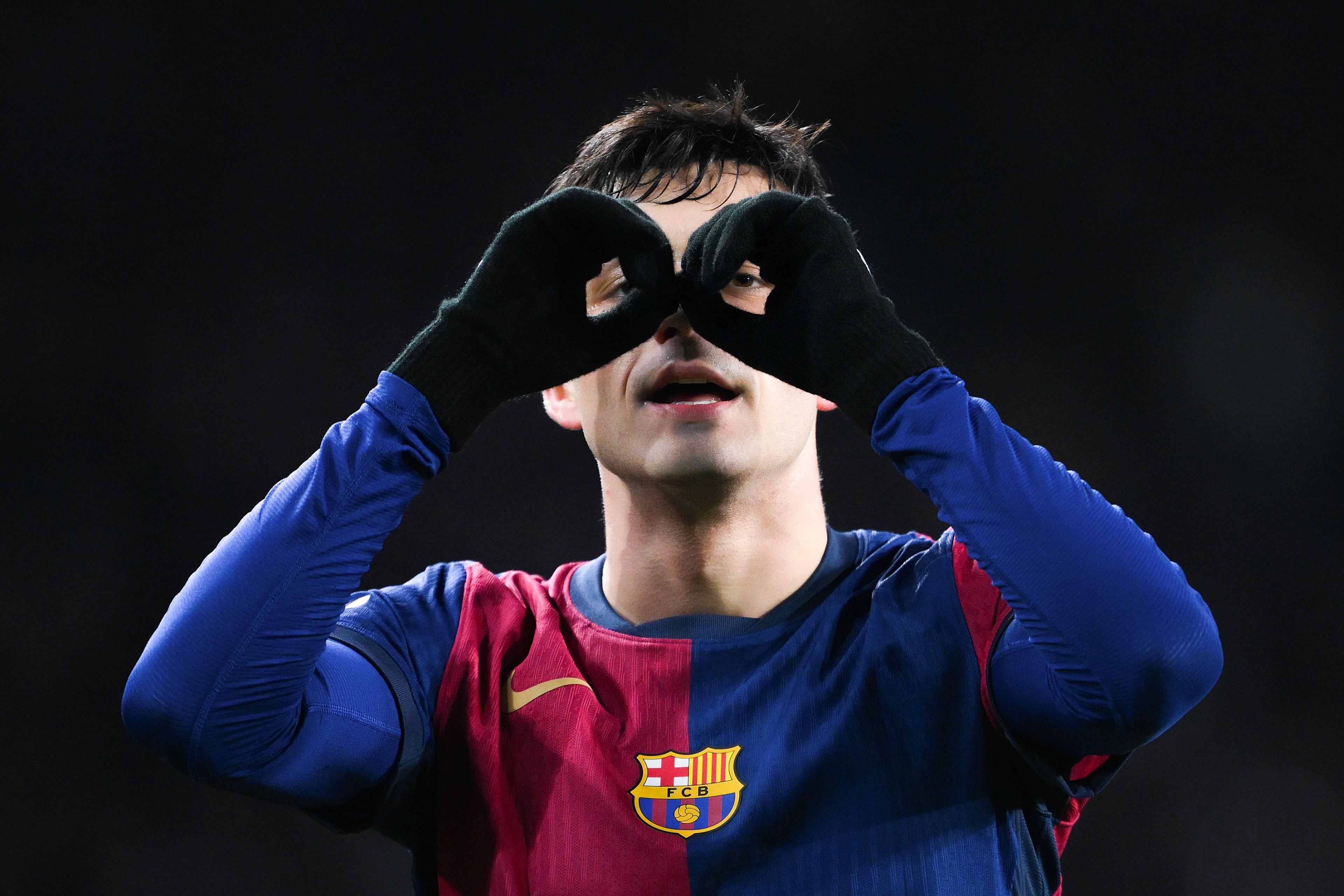 Pedri of Barcelona celebrates their team's first goal during the LaLiga match between Barcelona and Atletico de Madrid at Estadi Olimpic Lluis Companys in Barcelona, Spain