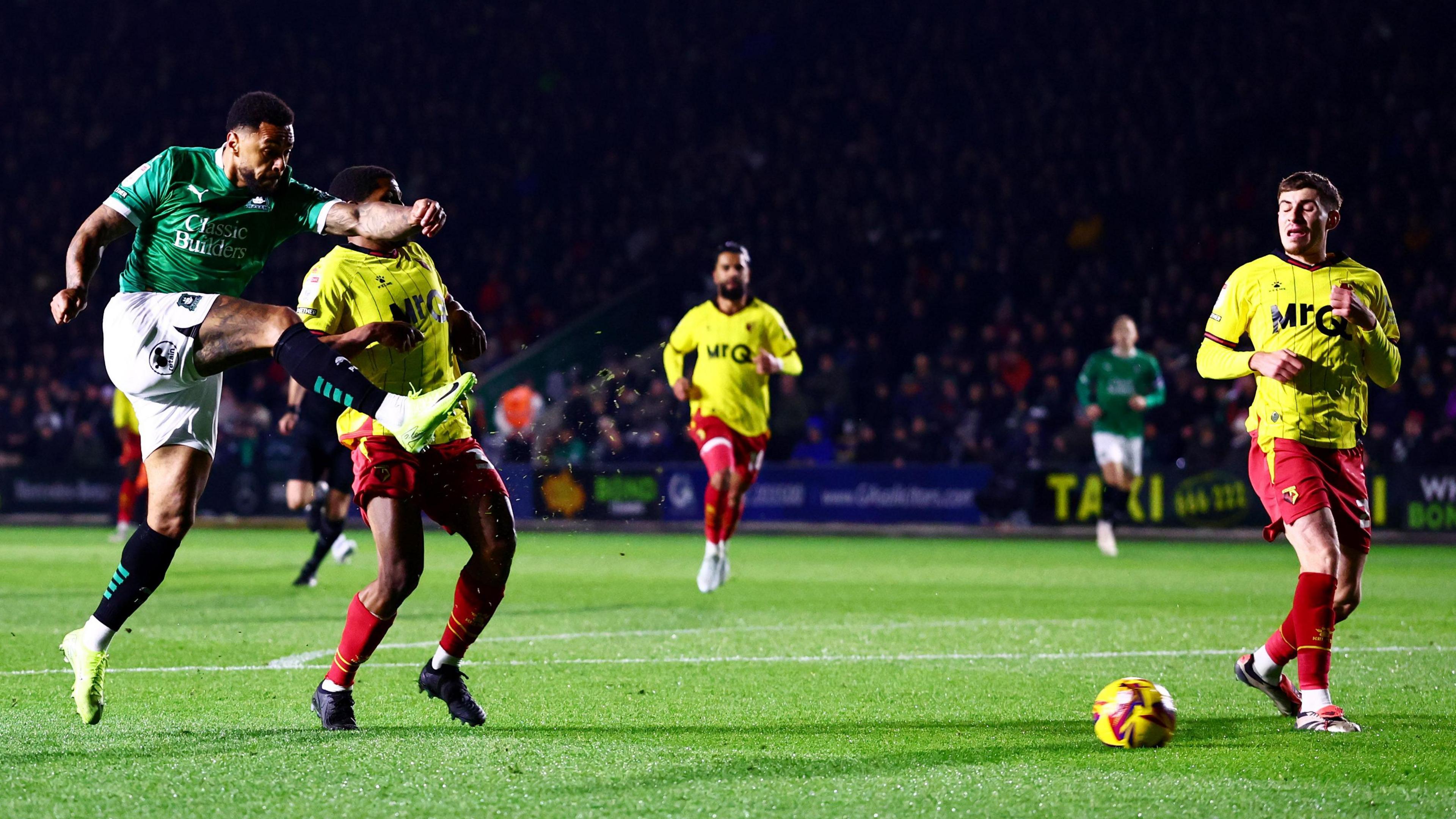 Andre Gray volleys in the first of his two goals for Plymouth against Watford