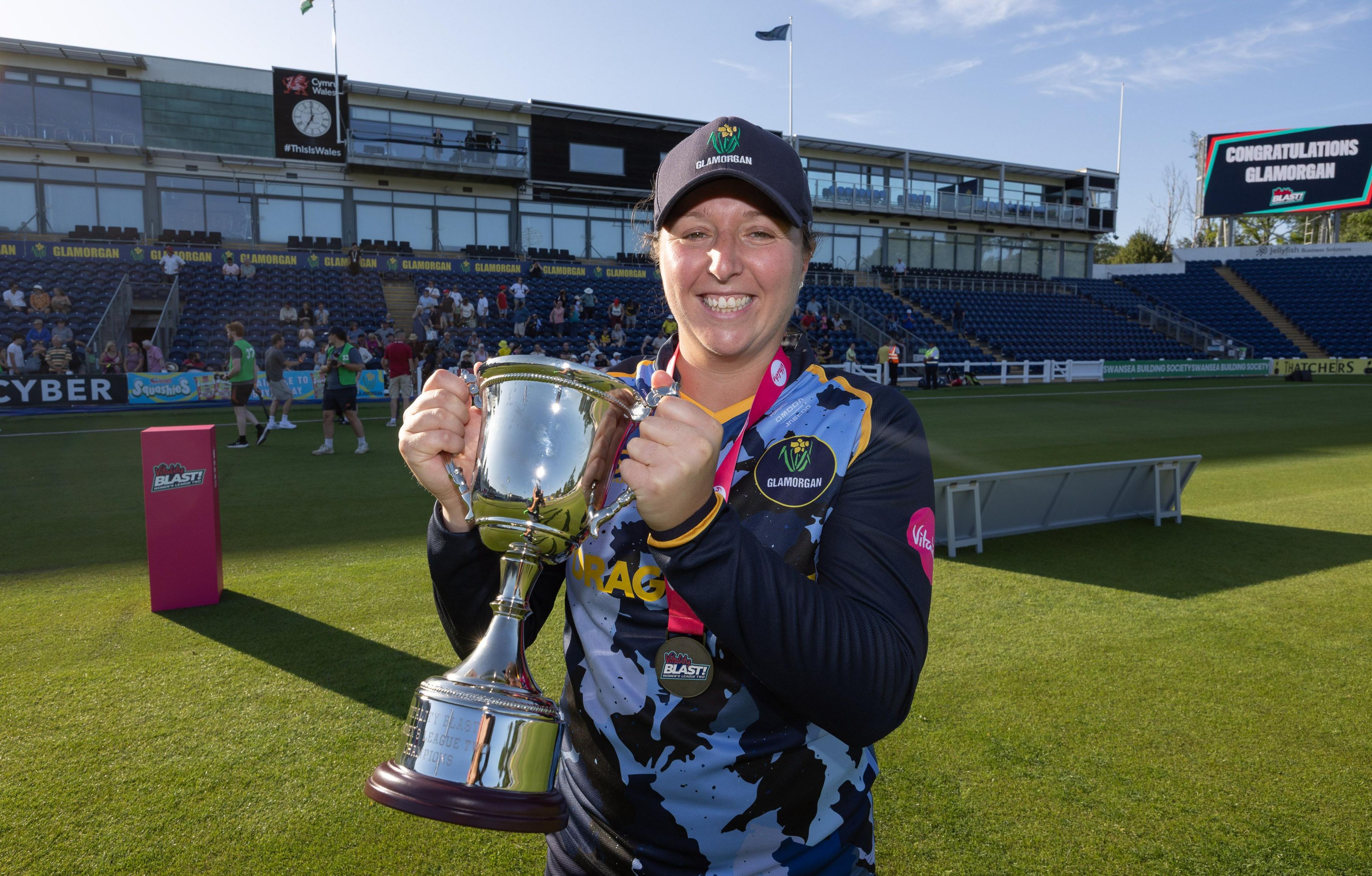 Glamorgan captain Lauren Parfitt lifting the Vitality Women's T20 Blast League 2 trophy after defeating Gloucestershire.