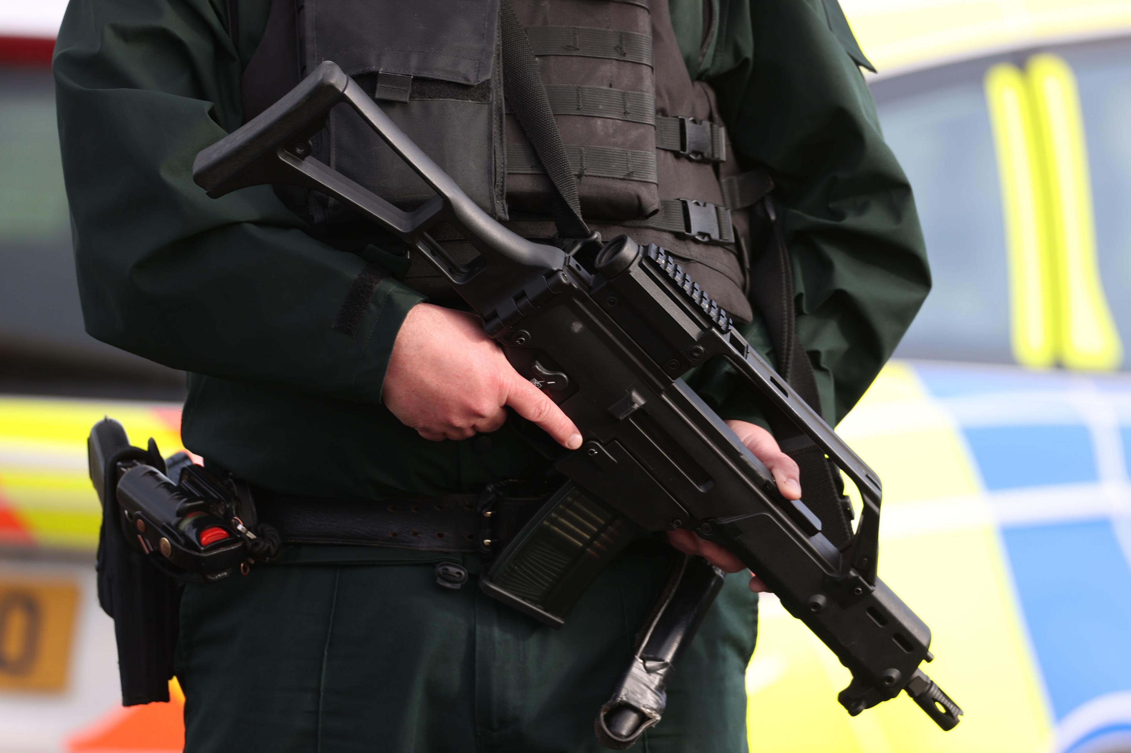 Police officer with gun