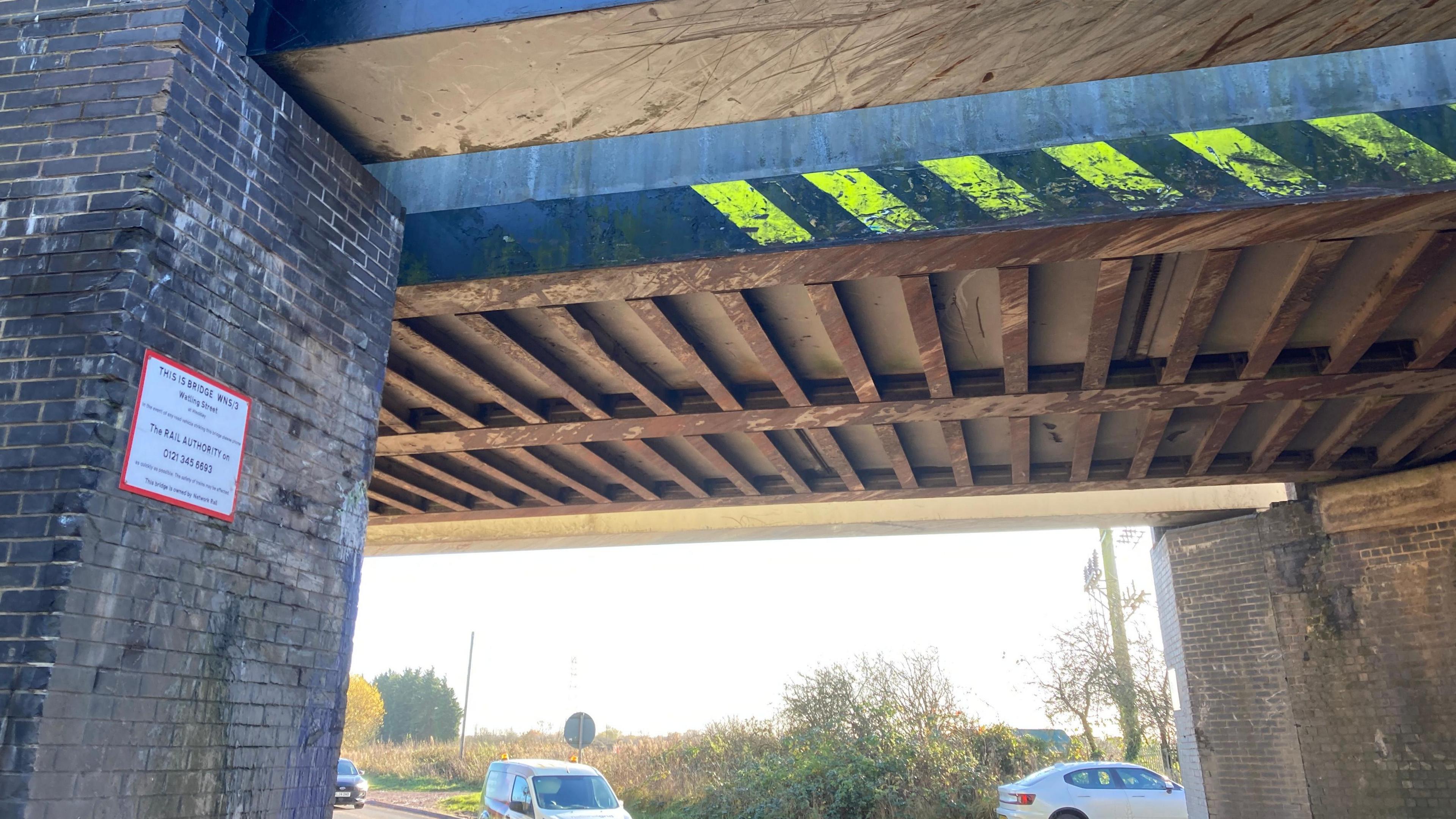 The picture shows underneath the A5 bridge. More scrapes from accidents be seen