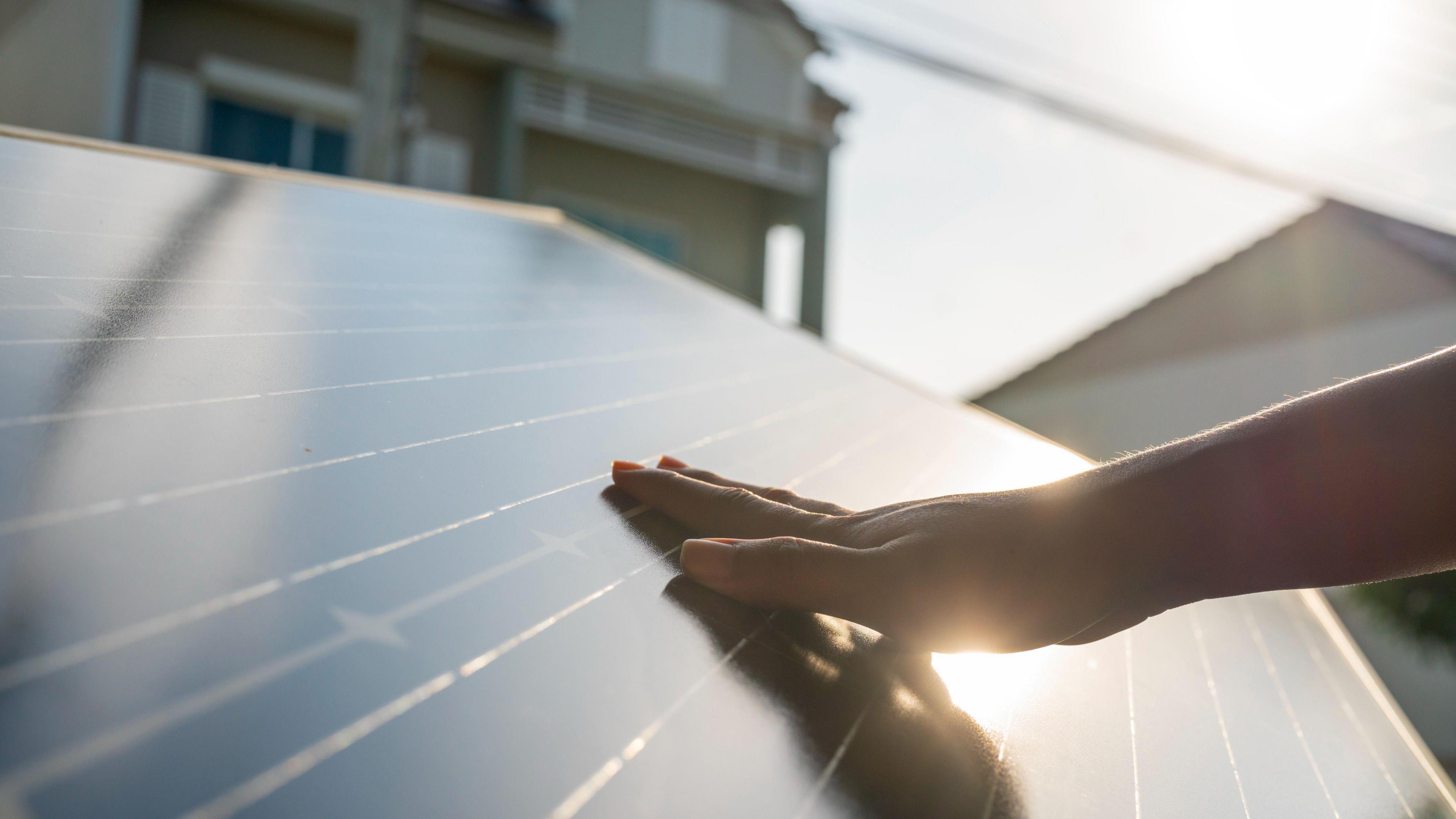 A set of solar panels on a domestic roof.