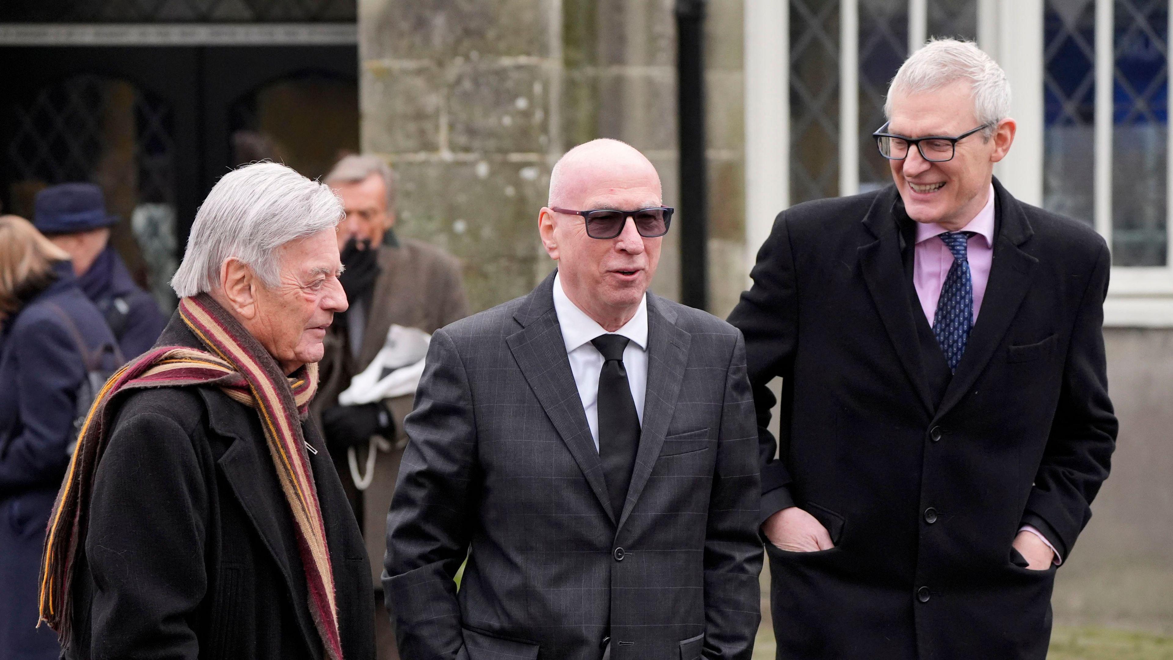 Tony Blackburn, Ken Bruce and Jeremy Vine following the funeral of DJ Johnnie Walker at St Peter's Church in Shaftesbury.