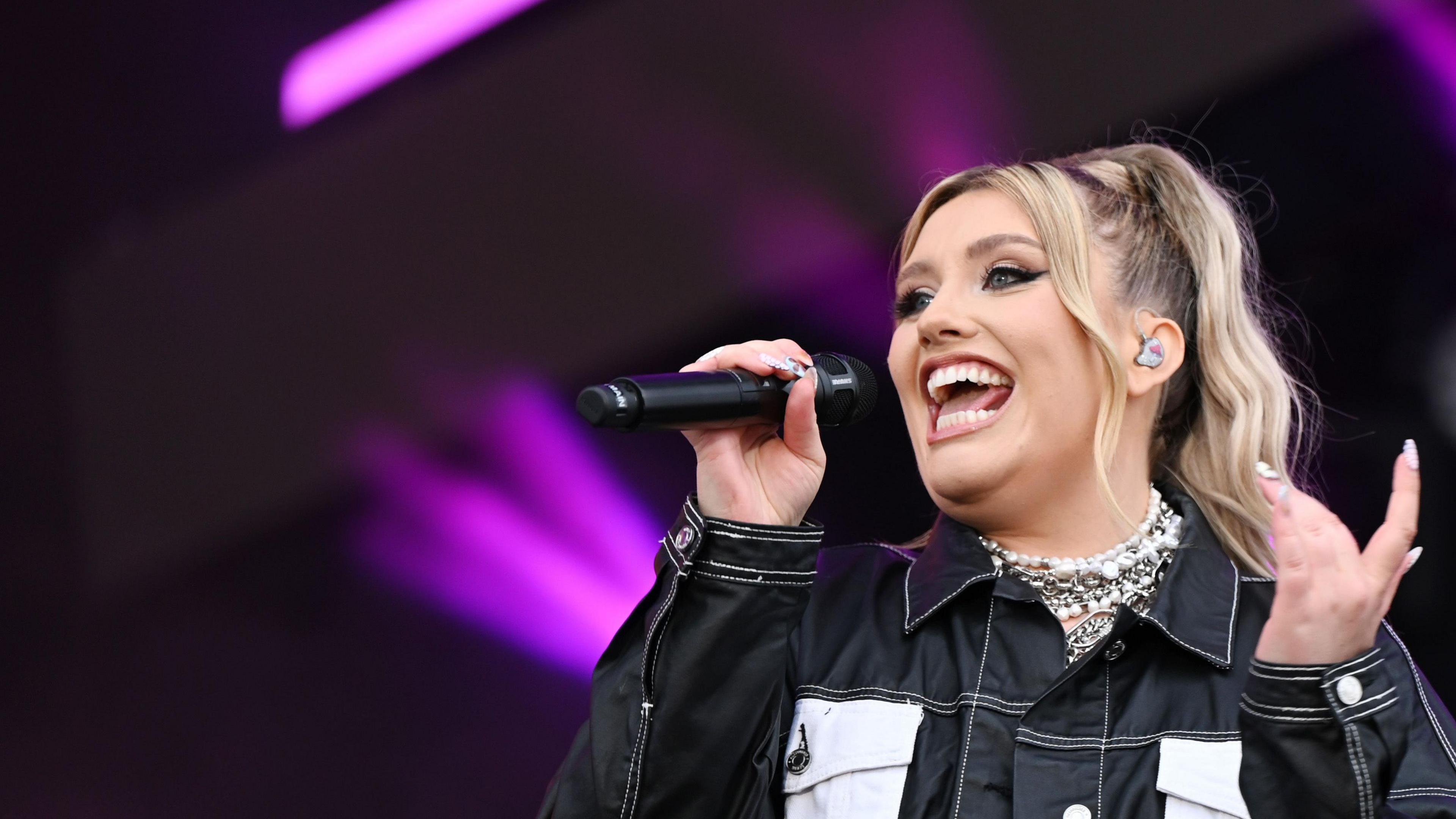 Singer Ella Henderson performing on stage