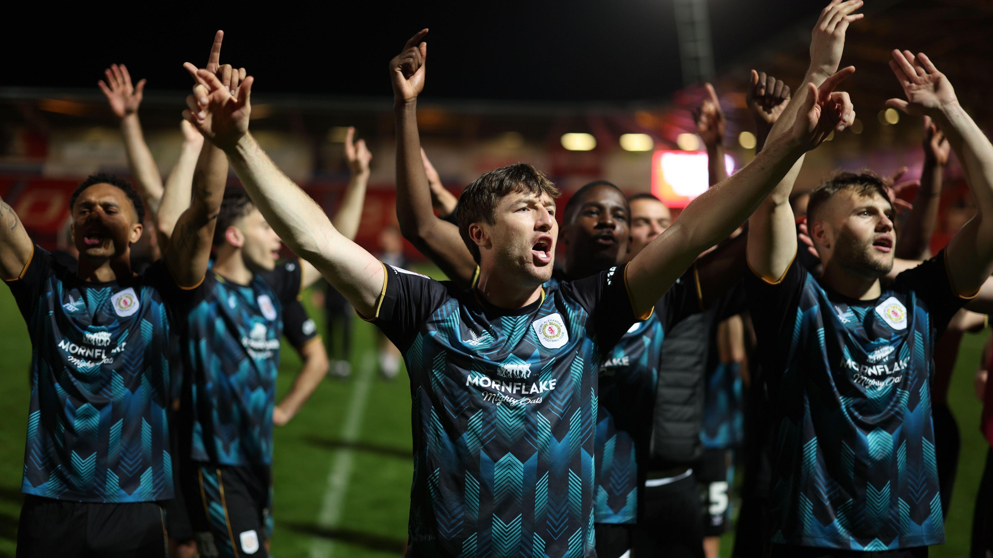 Crewe celebrate winning at Doncaster in play-off semi-final last May