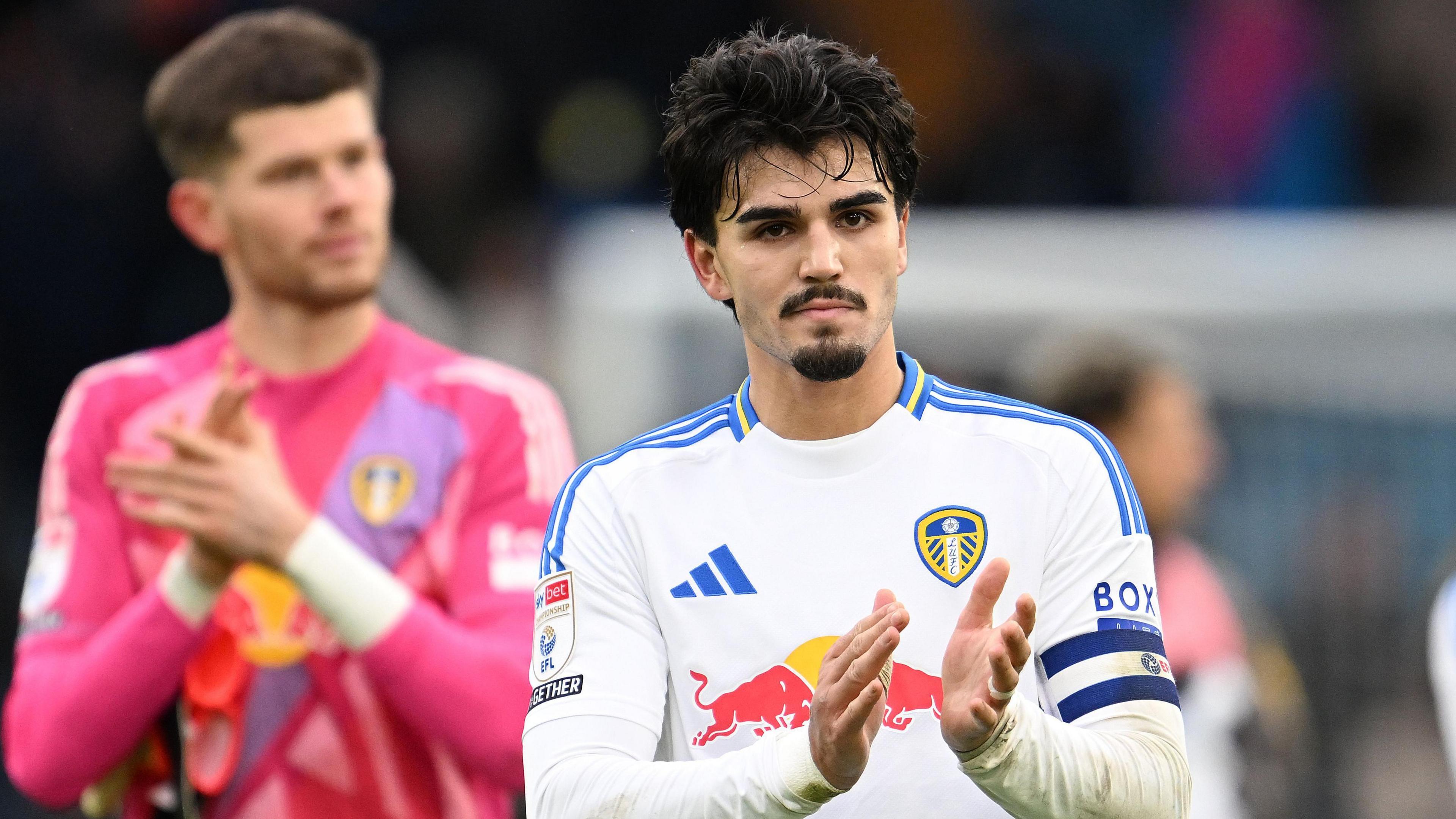 Leeds United's Pascal Struijk applauding fans at Elland Road