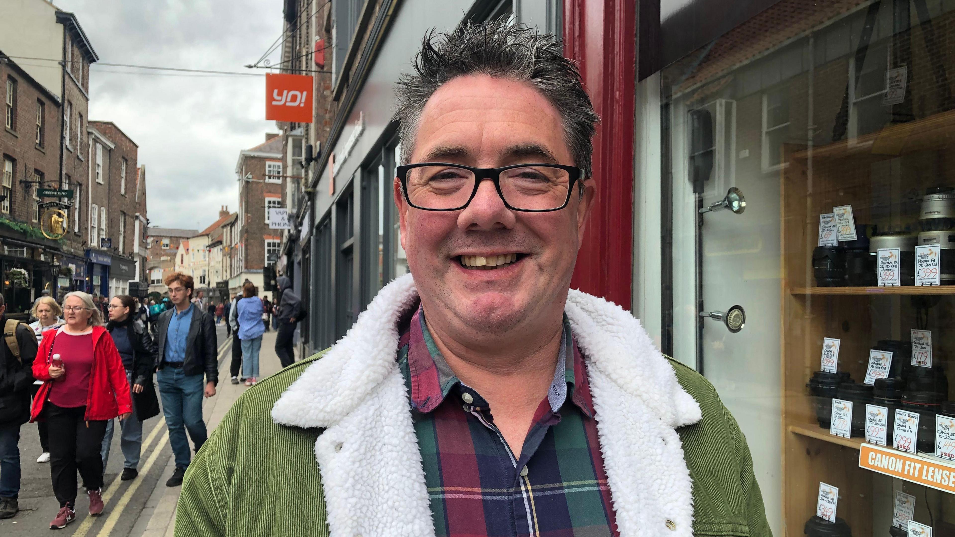 Man standing on York City Centre street