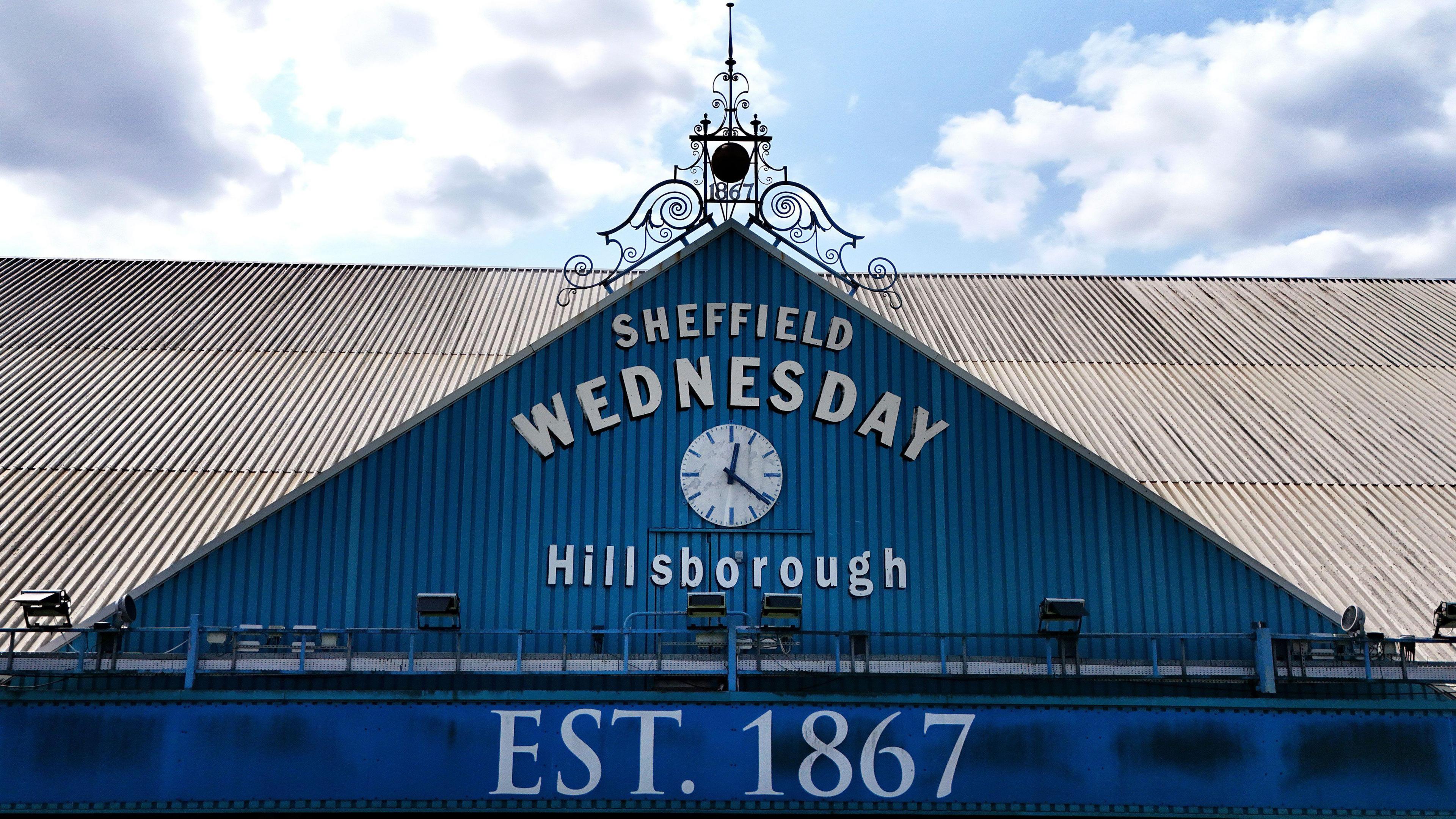 A general view of the South Stand and the Sheffield Wednesday badge at Hillsborough