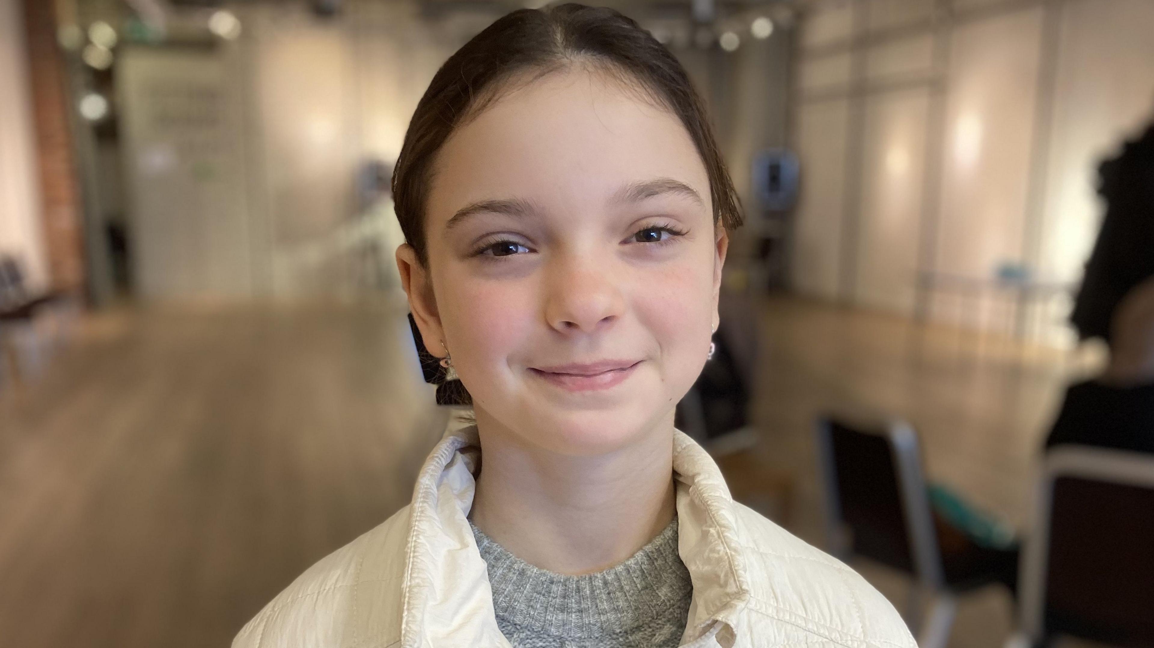 Ukrainian refugee 12-year-old Zlata smiling during an oral health session at the Swindon Hub