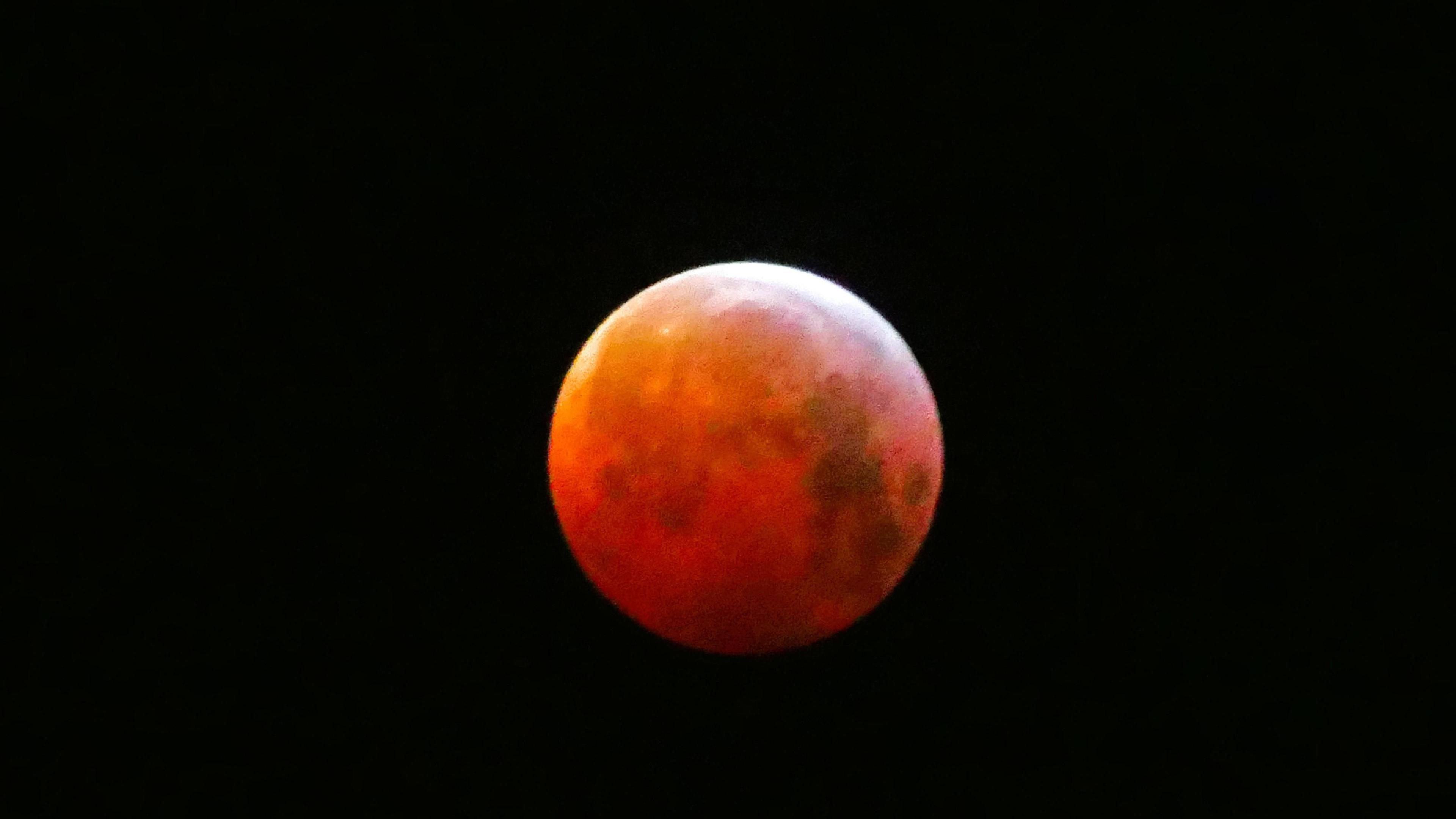An image of the Moon captured during the lunar eclipse on 7 September when the Moon took on a red hue as it passed through Earth's shadow.
