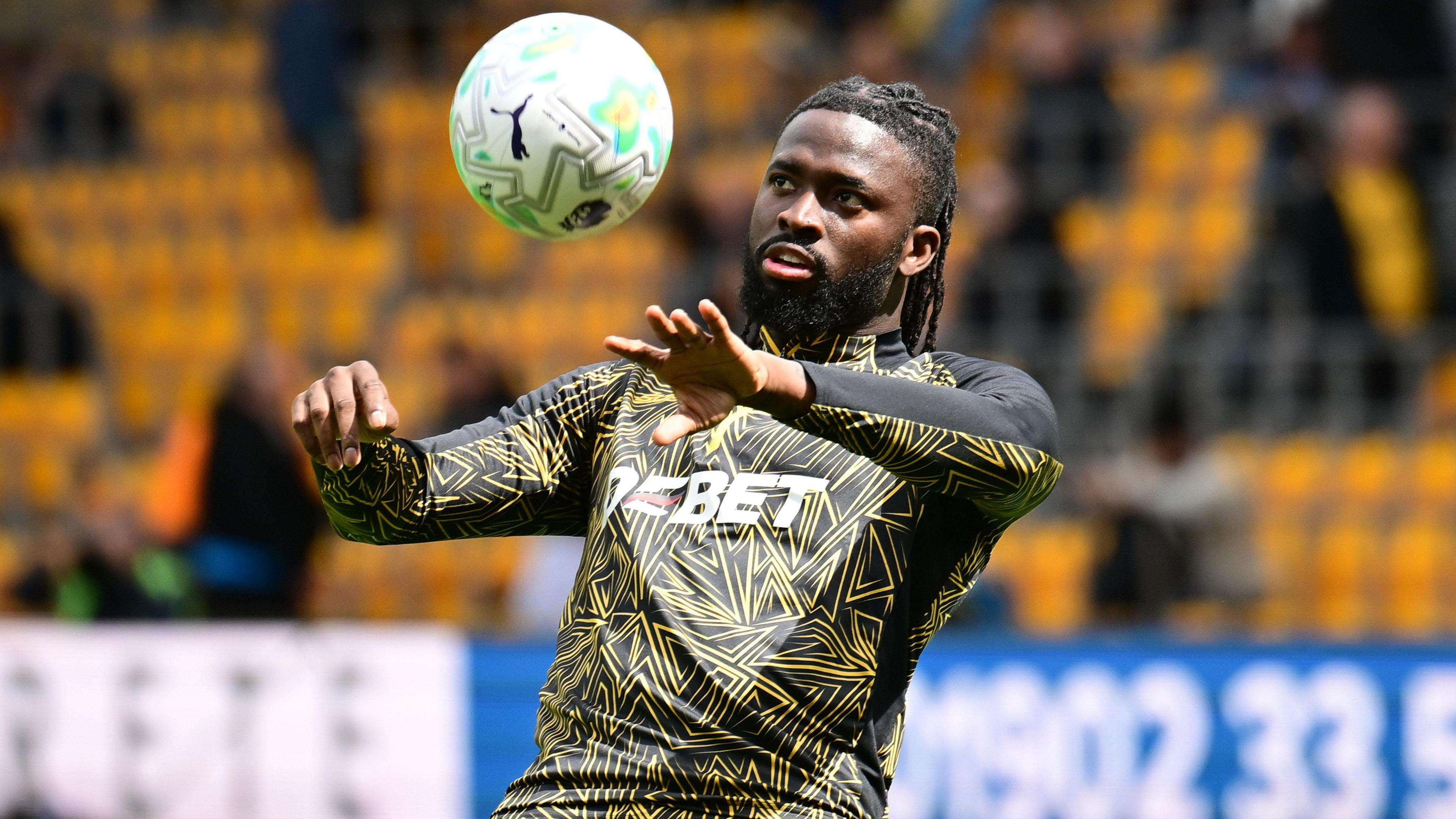 Tolu Arokodare controls the ball on his chest during a warm-up session before Wolves' Premier League match with Fulham 