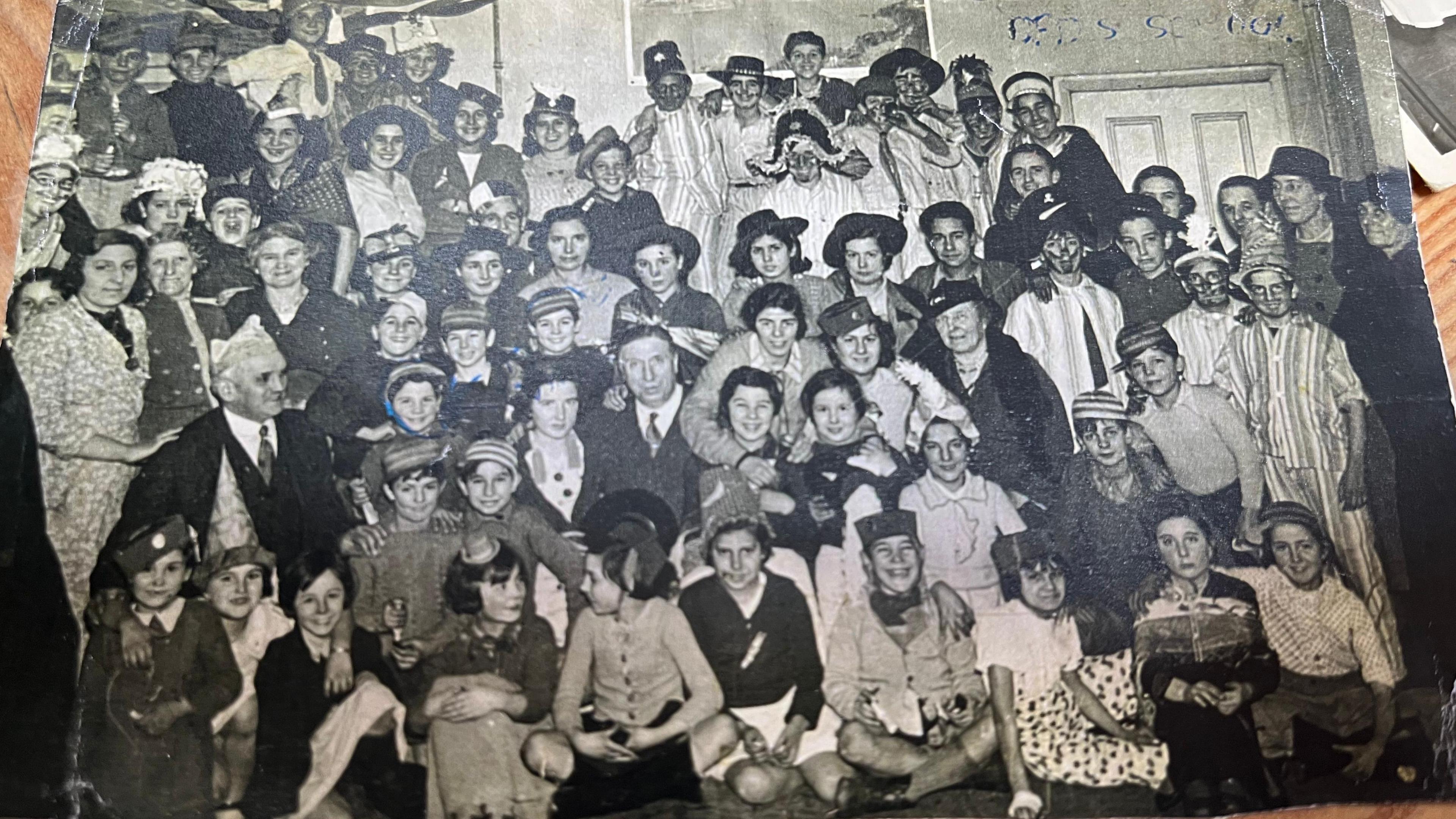 A black and white photo of the Basque children who came to Caerleon, and some of those who looked after them. The group consists of about 60 children and adults.