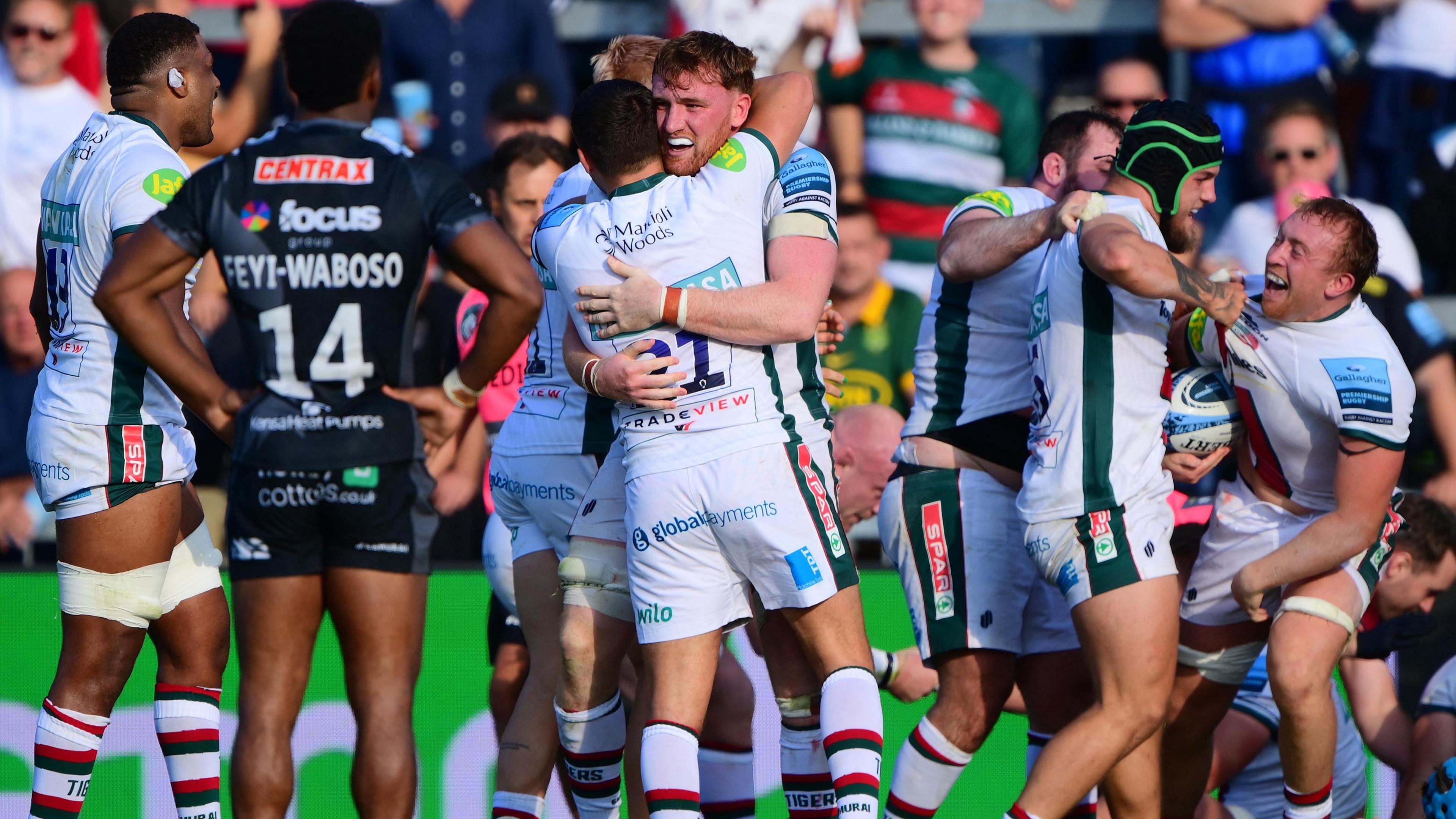 Tommy Reffell (right) celebrates scoring Leicester's last-gasp winning try at Sandy Park