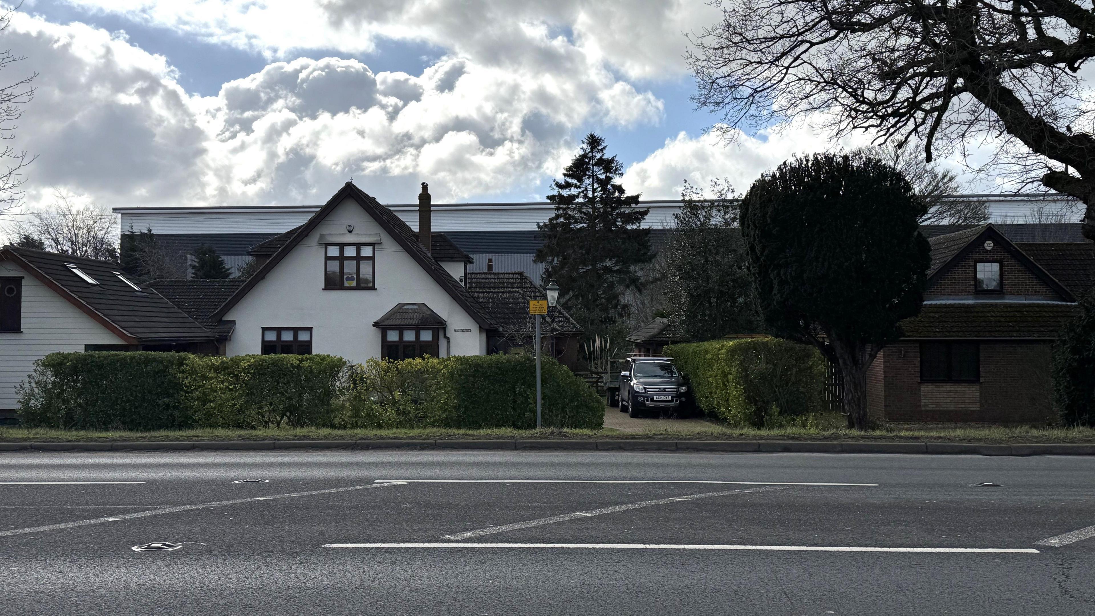 A view of the warehouse positioned behind homes in Felixstowe Road.