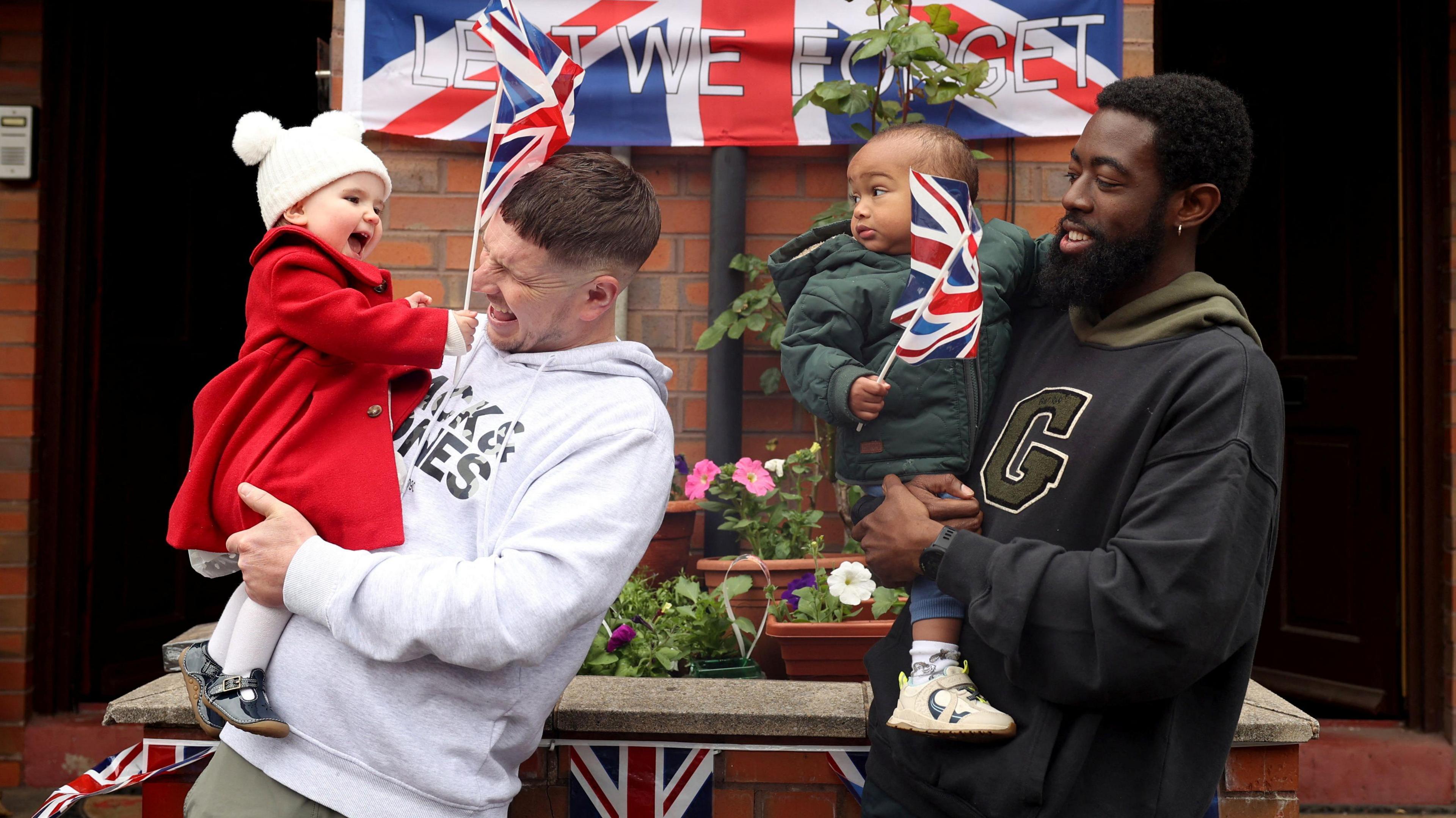 Residents take part in a street party during bank holiday celebrations commemorating the 80th anniversary of Victory in Europe (VE) Day, in Manchester