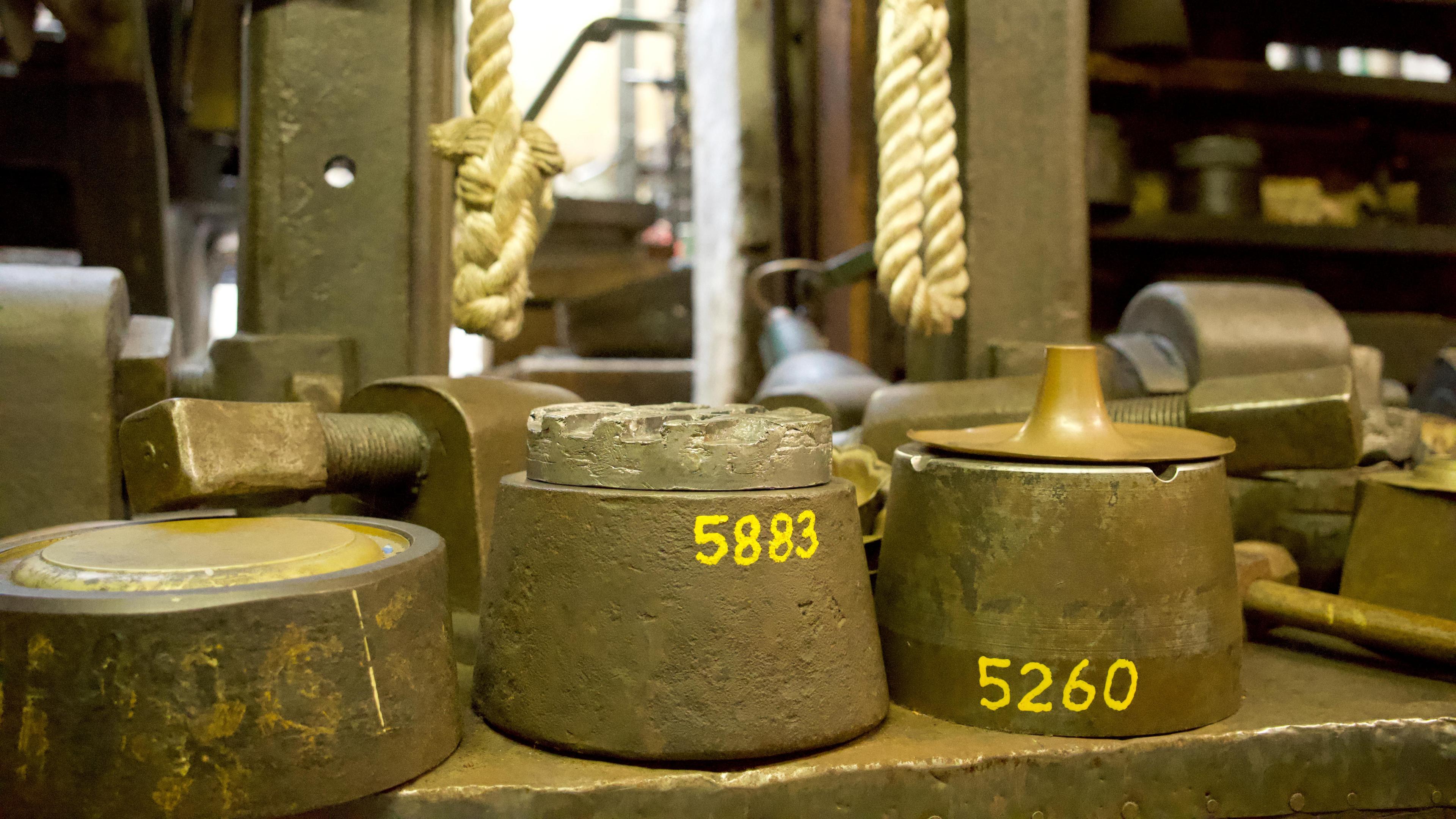 The interior of an old silver factory with metal stamps. The interior is as if the factory was still open today