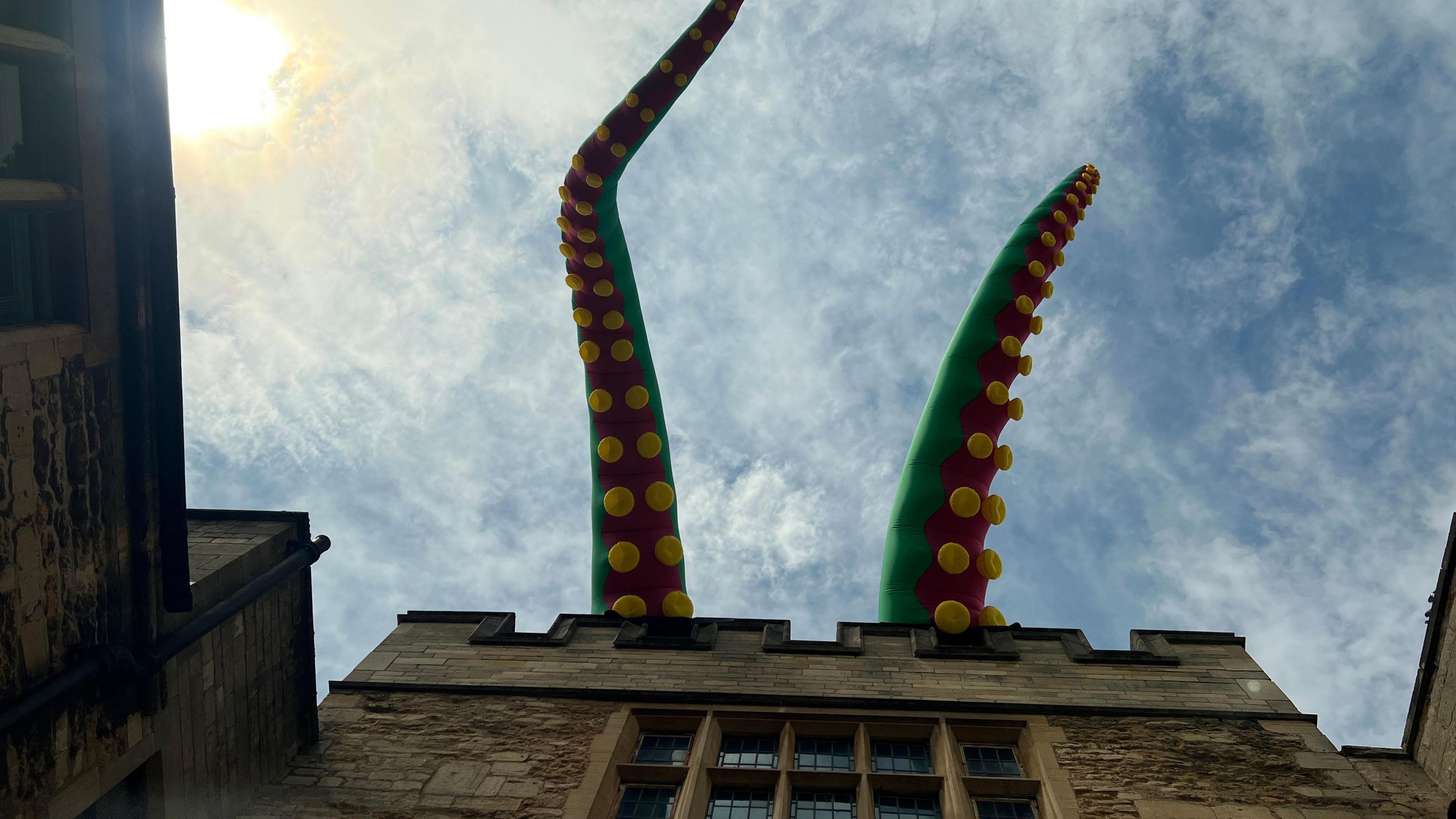 An inflatable tentacle on the top of Peterborough Cathedral 