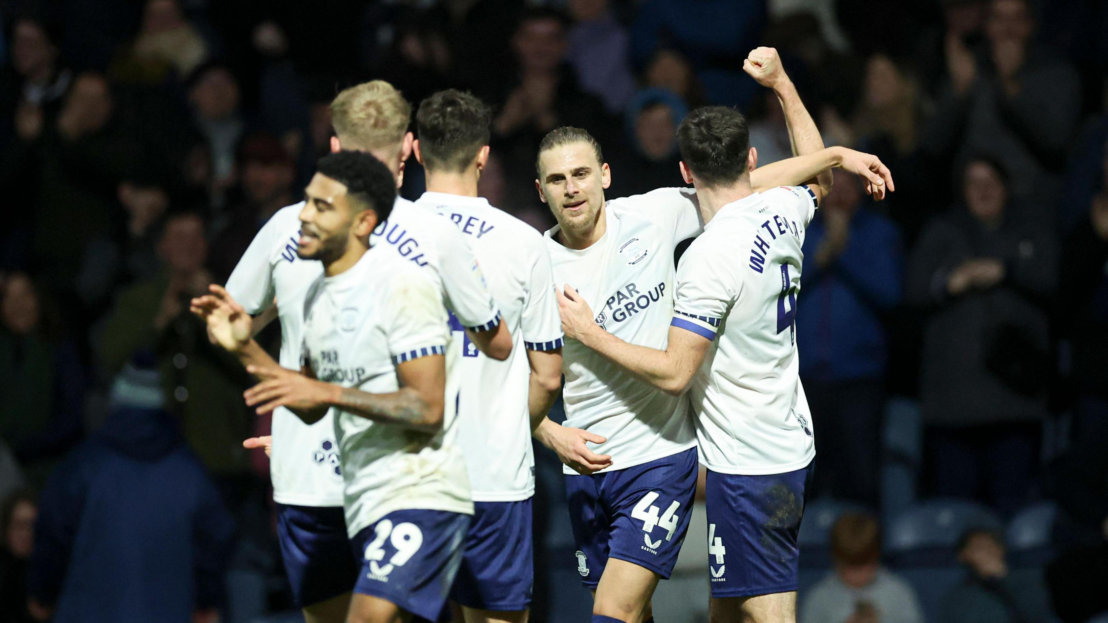 Preston players celebrate taking the lead against Hull City