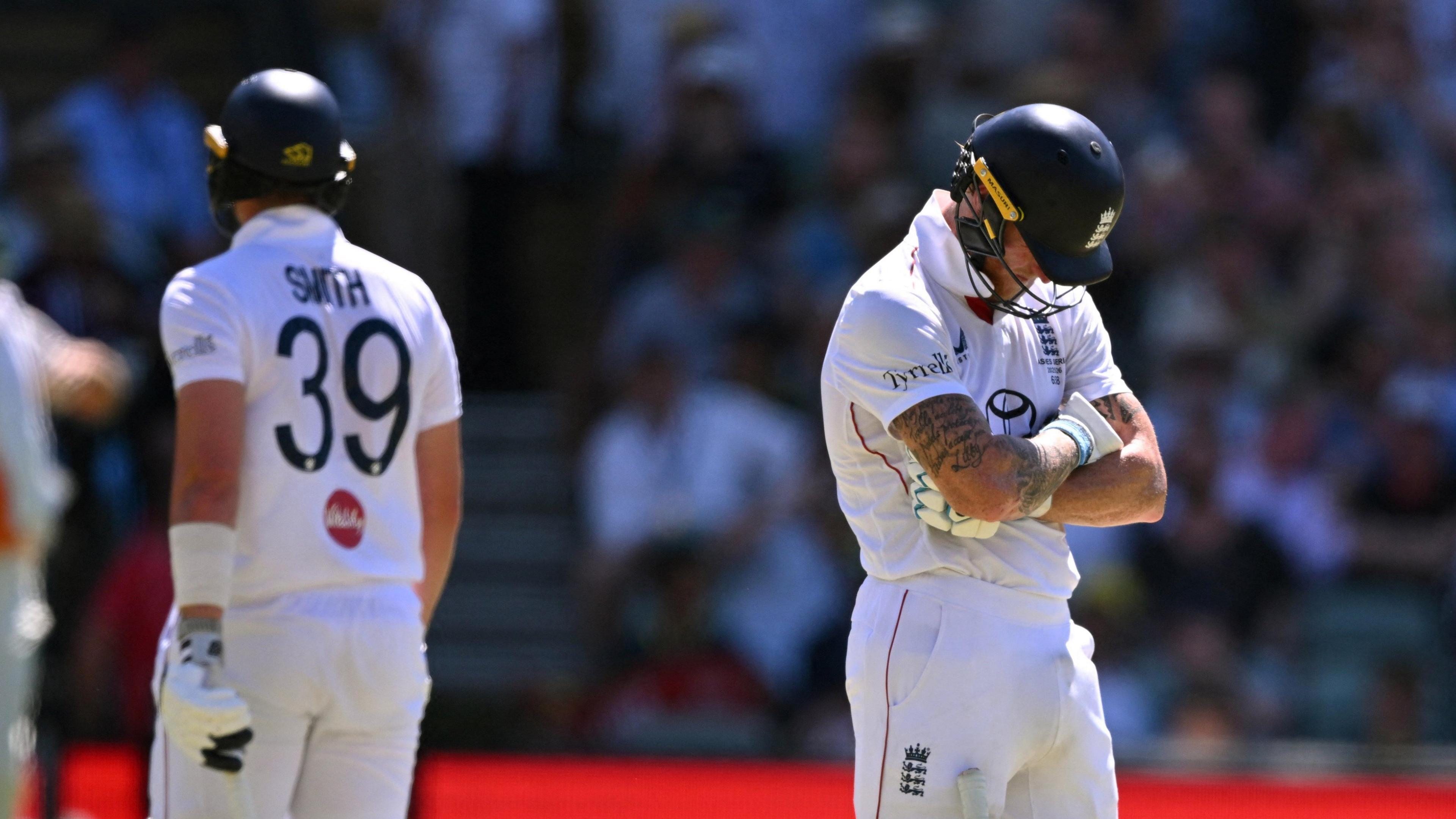Ben Stokes looks to the ground after Smith is given out