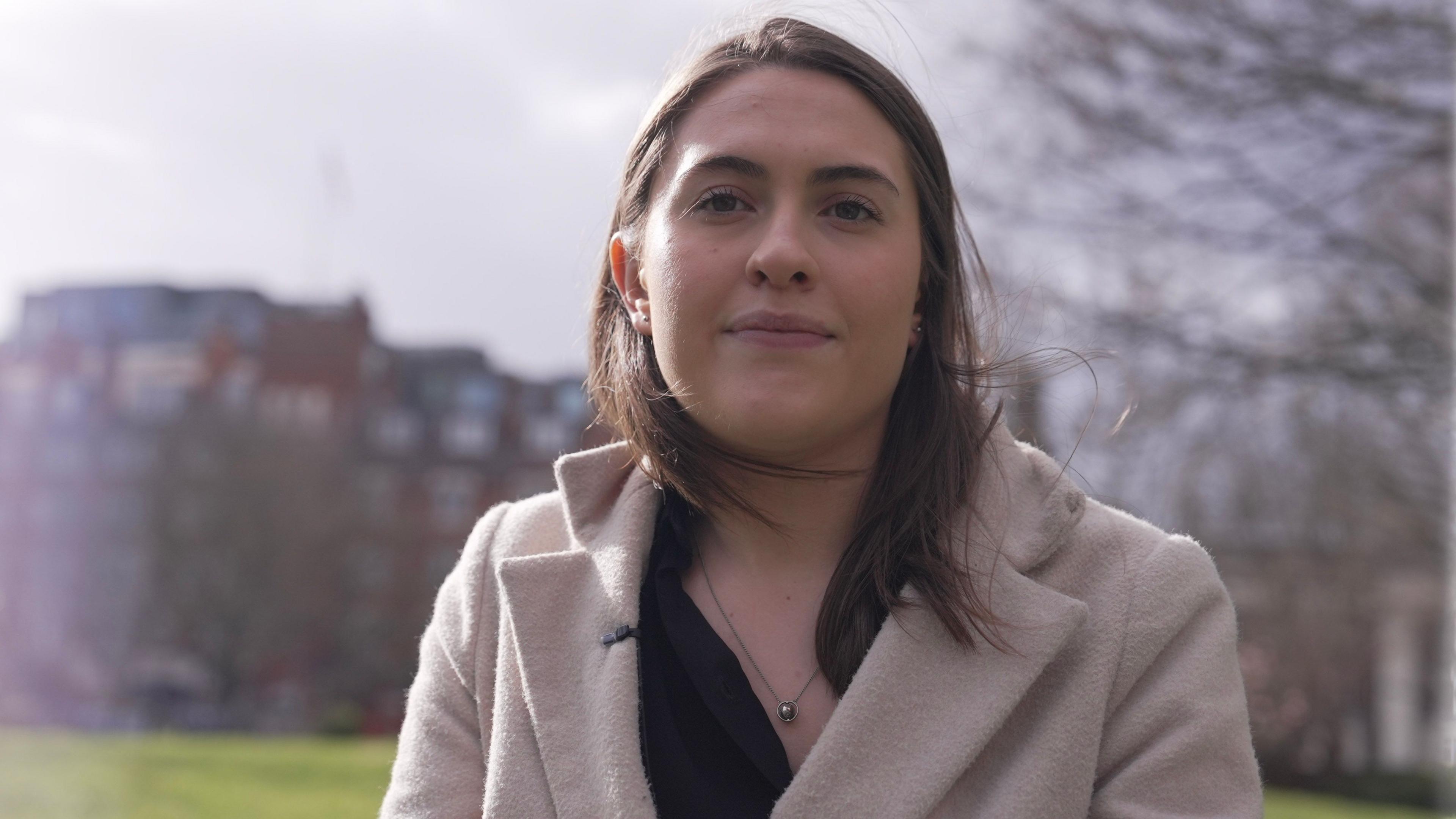 Jess Ralston standing in a park