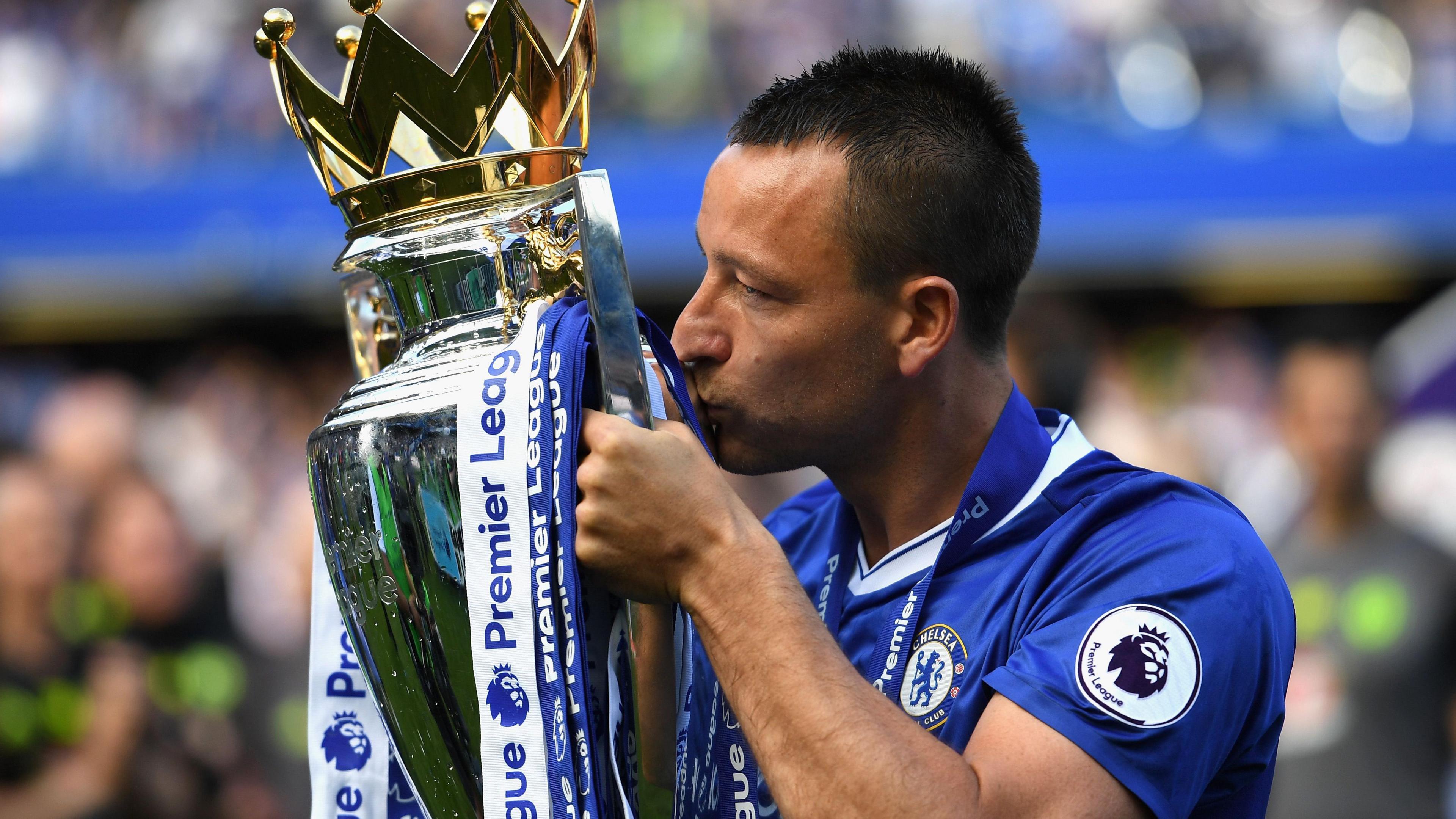 John Terry kisses the Premier League Trophy