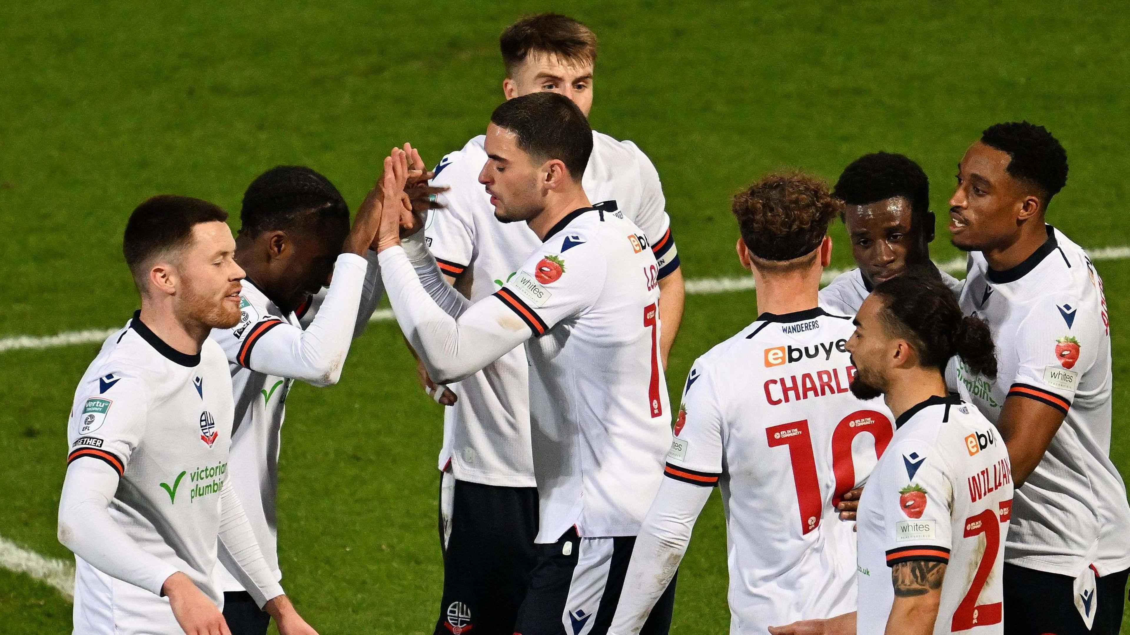 Bolton celebrate scoring against Huddersfield