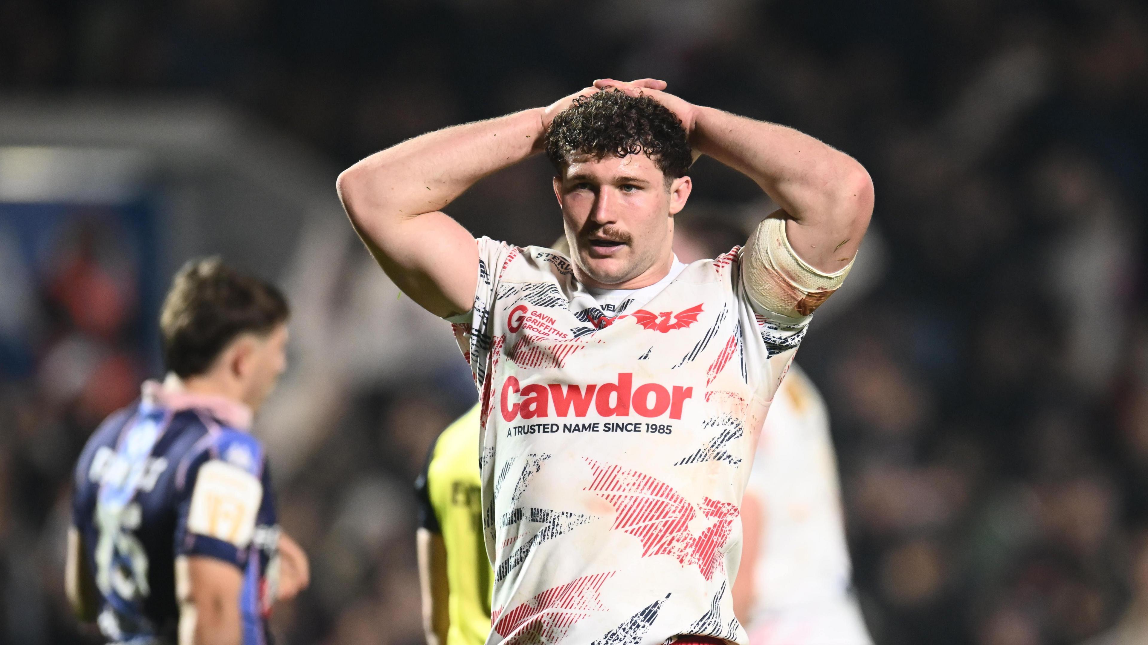 Scarlets back-row Fletcher Anderson looking dejected