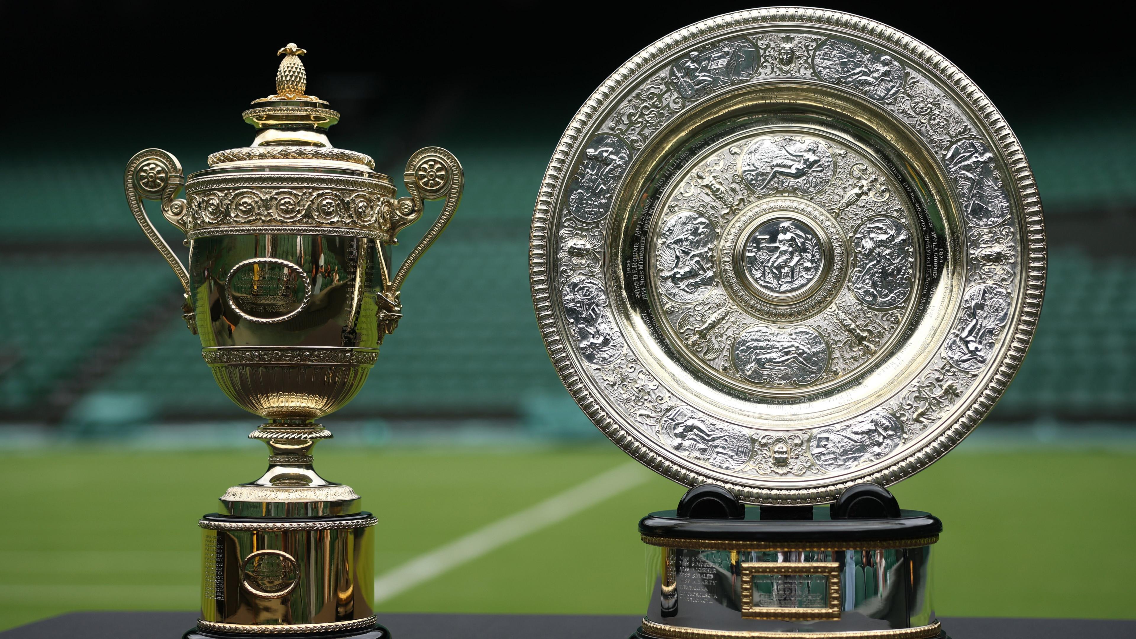 The men's and women's Wimbledon trophies
