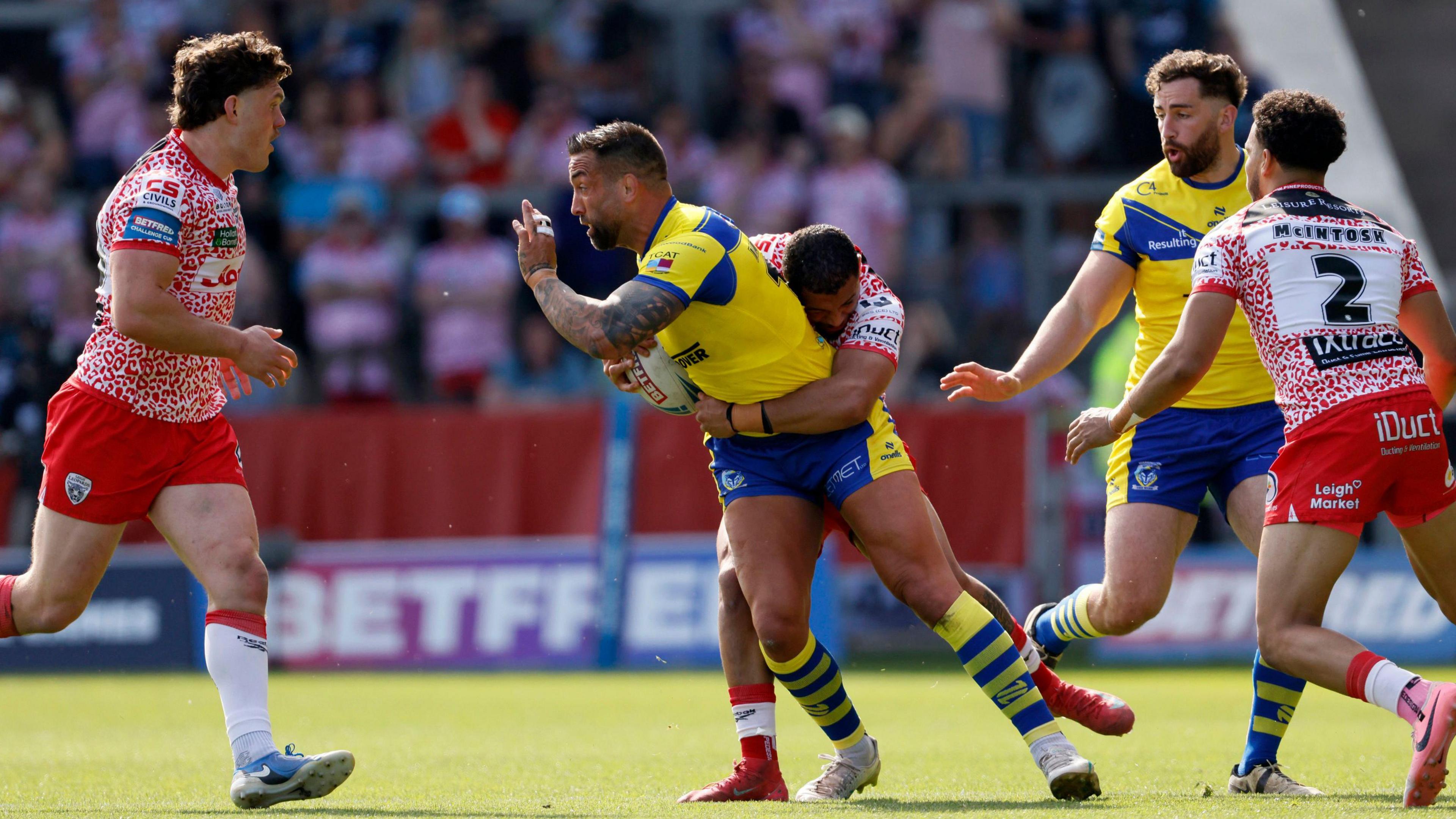 Warrington Wolves versus Leigh Leopards in rugby league match, May 2025