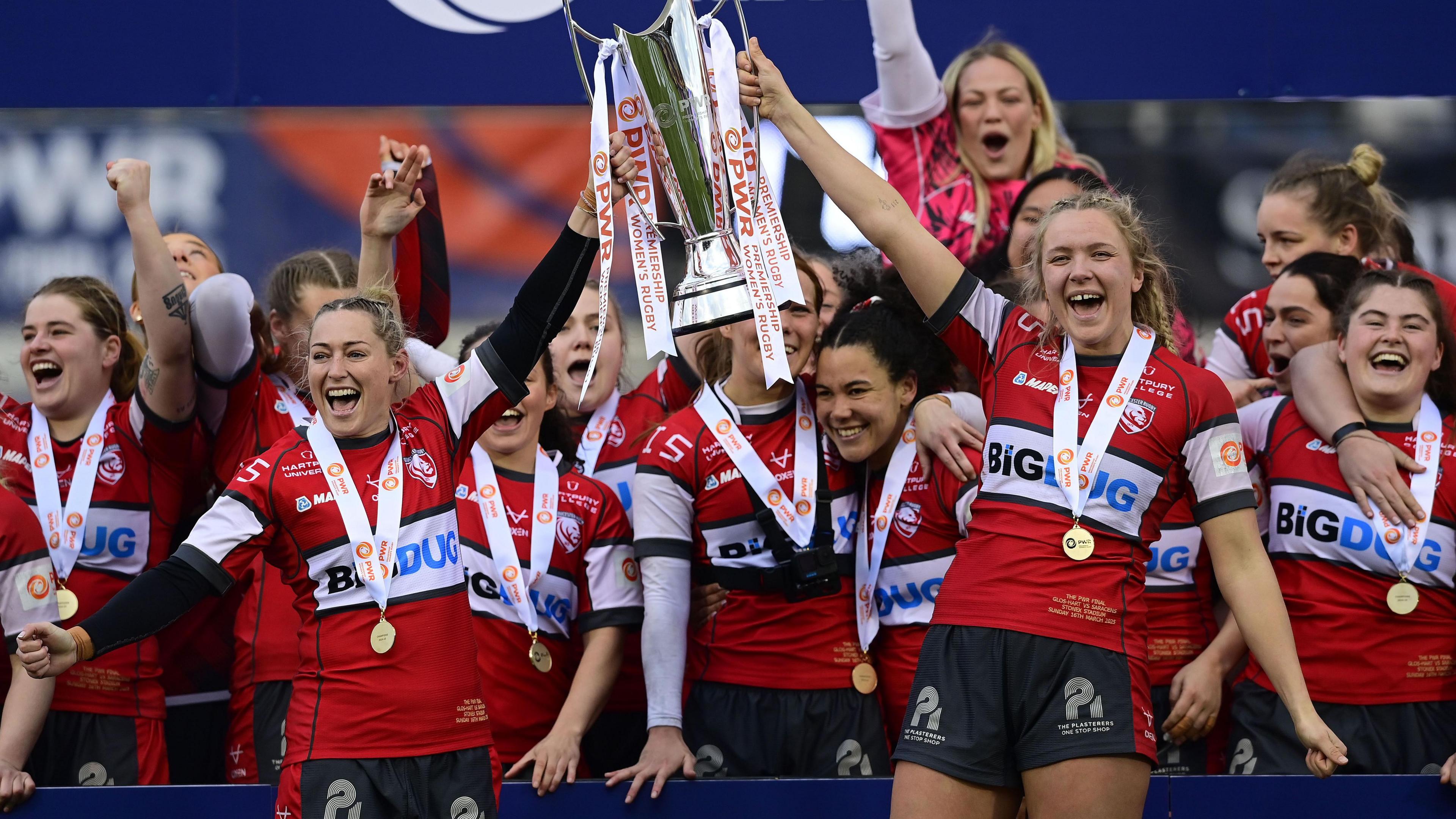 Gloucester-Hartpury co-captains Natasha 'Mo' Hunt and Zoe Aldcroft lift the PWR Trophy