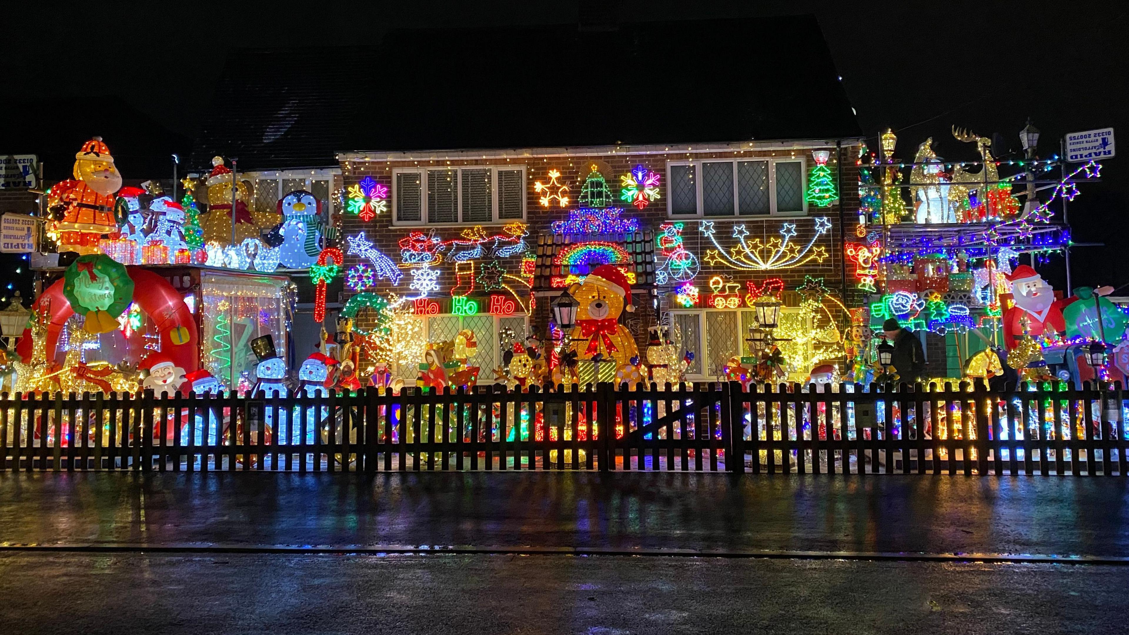 A house with thousands of christmas lights