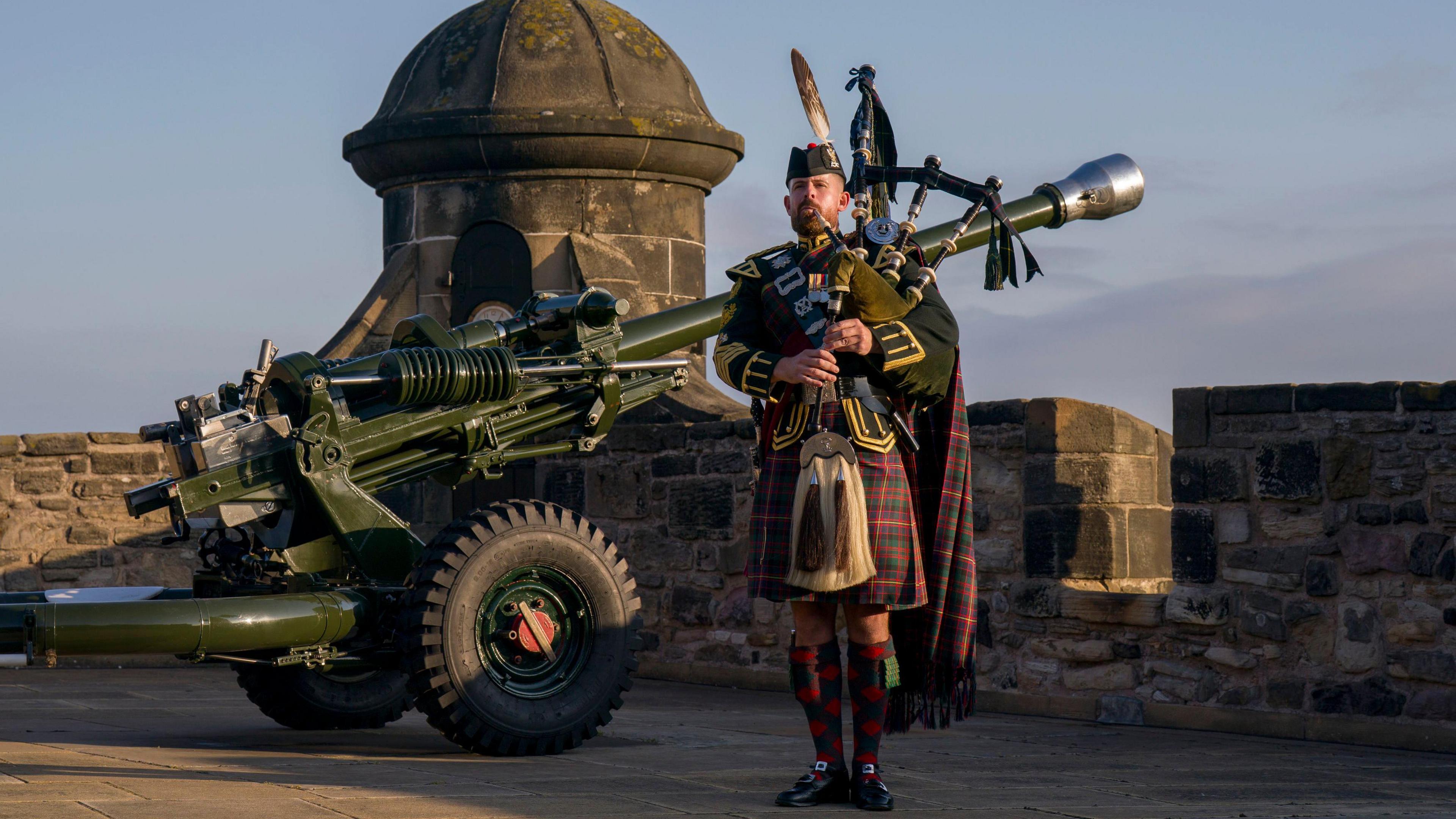 At Edinburgh Castle Senior Pipe Major Peter Grant played the bagpipes to mark the day of remembrance