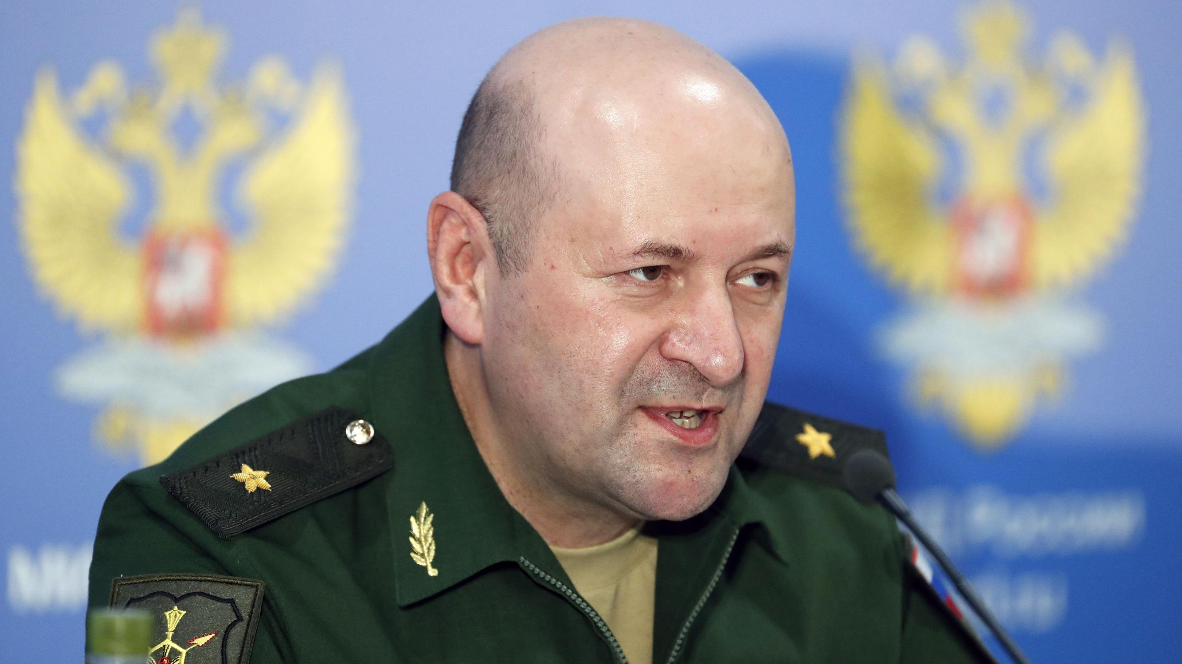 Kirillov pictured wearing Army uniform and speaking at a news conference