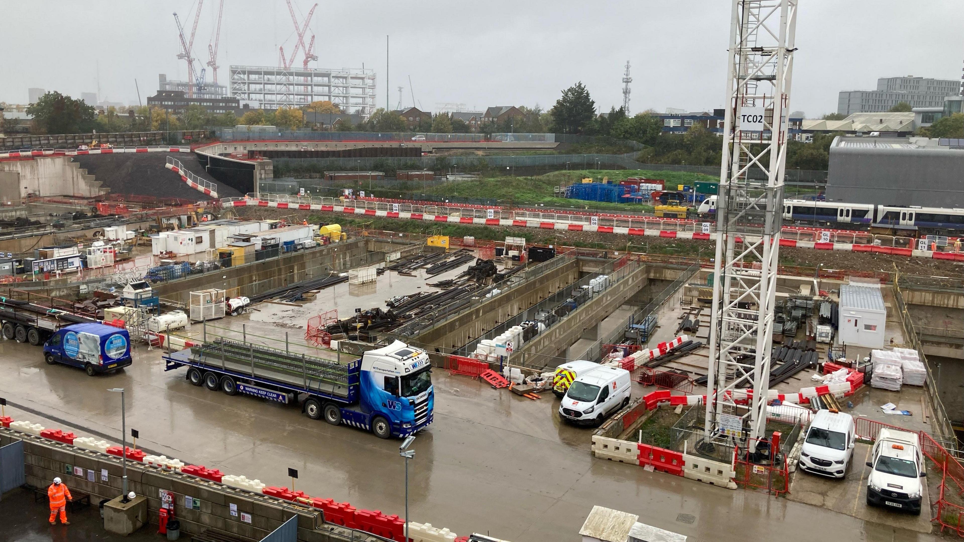 Lorries await to unload at Old Oak Common