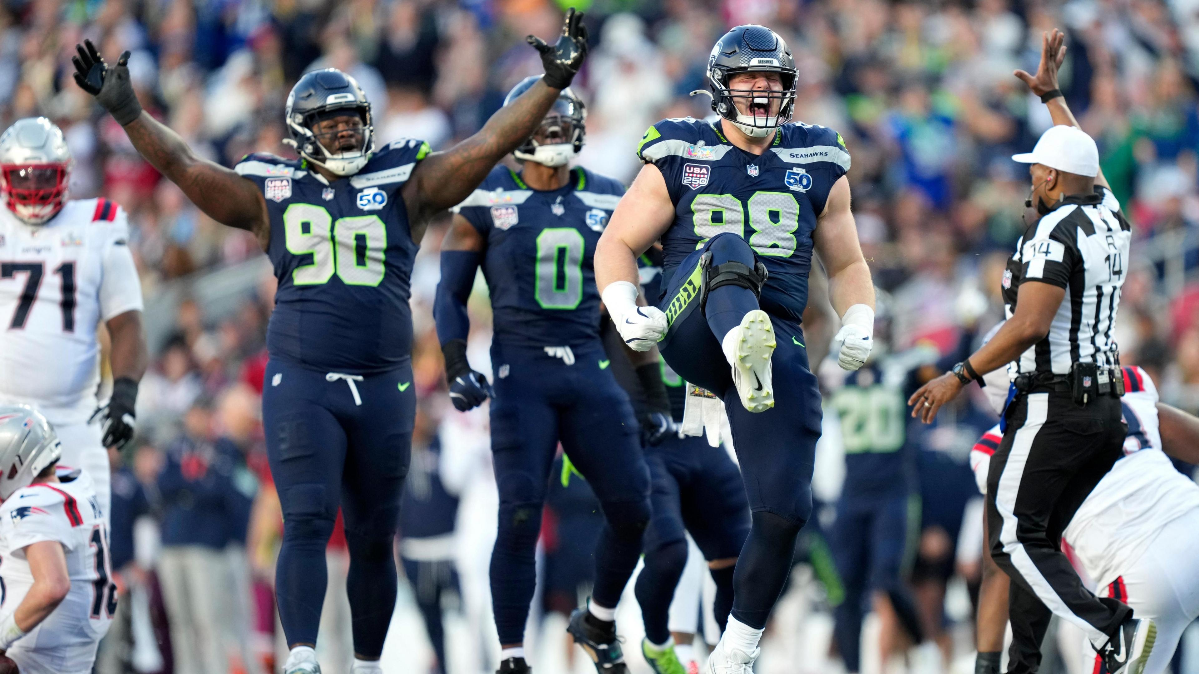Seahawks defensive tackle Rylie Mills reacts after sacking New England Patriots quarterback Drake Maye during the second quarter in Super Bowl LX