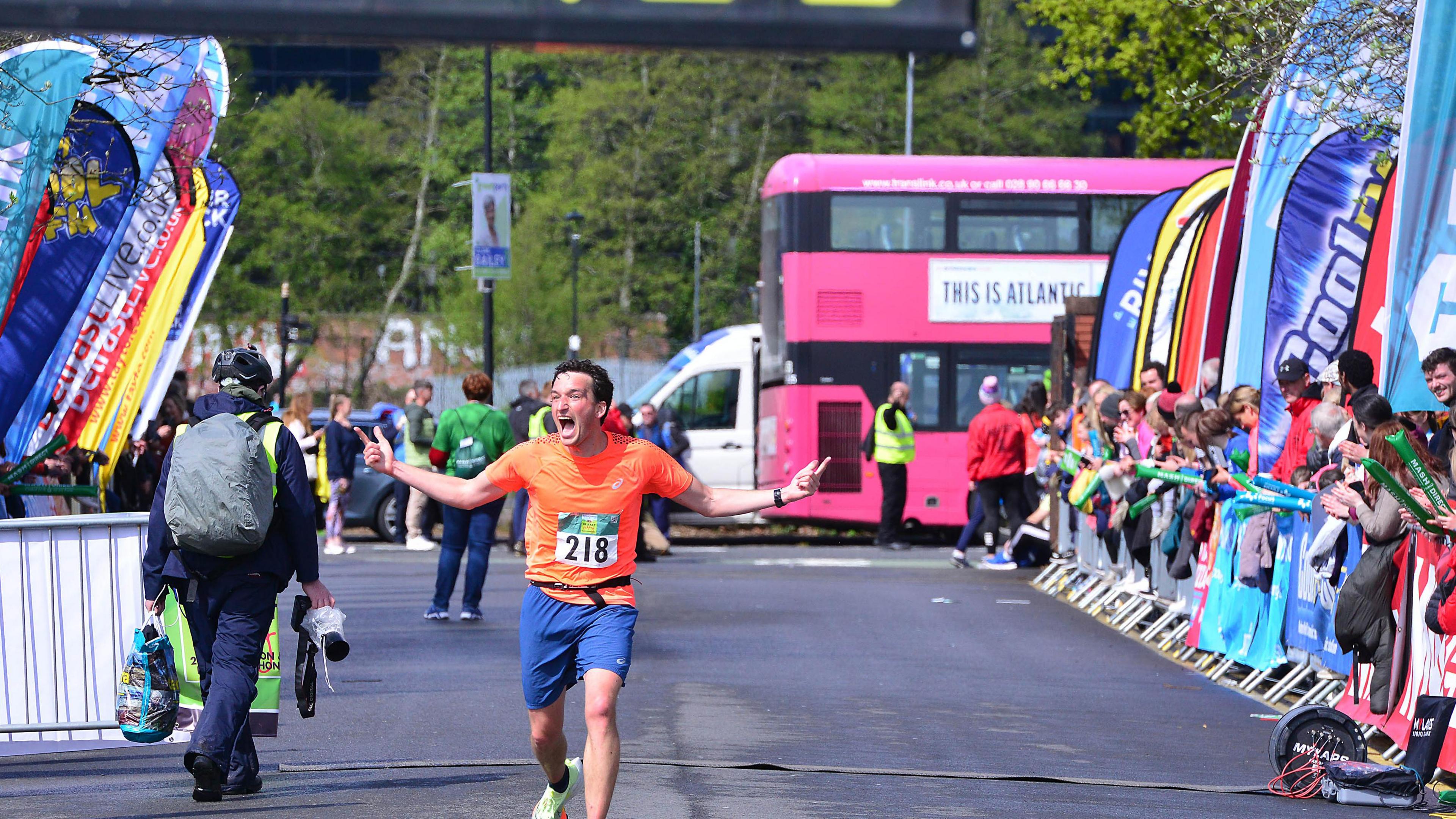 A runner comes up to the finish line