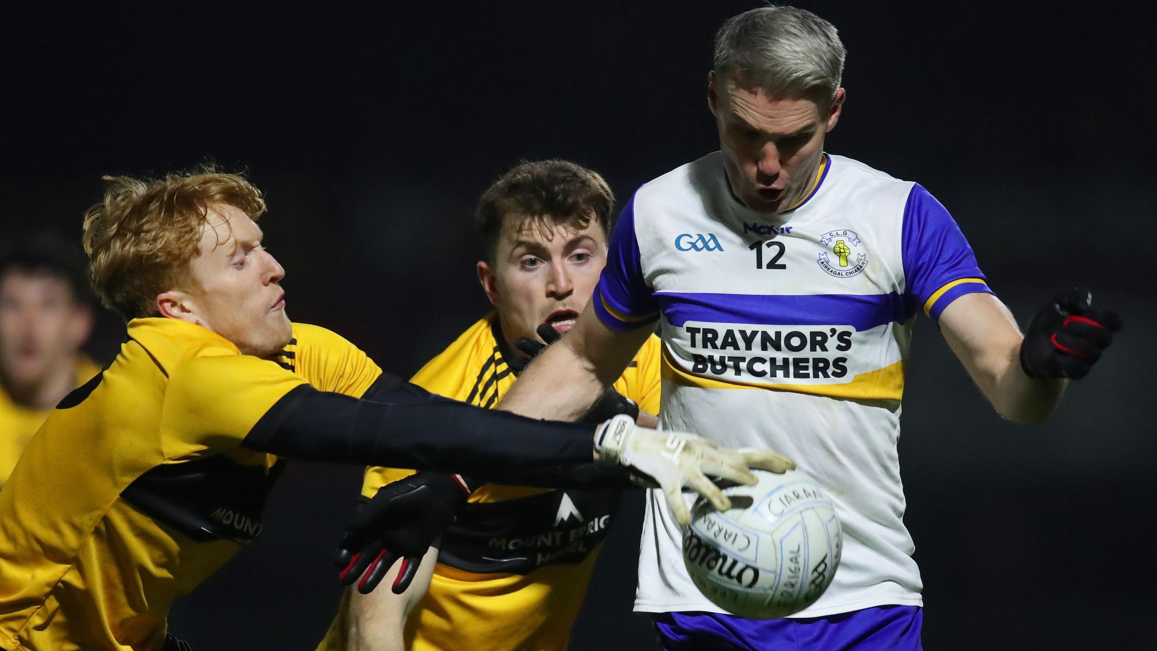 Eoin McGeehin of St Eunan's blocks a shot from Ciaran McGinley in the preliminary round game