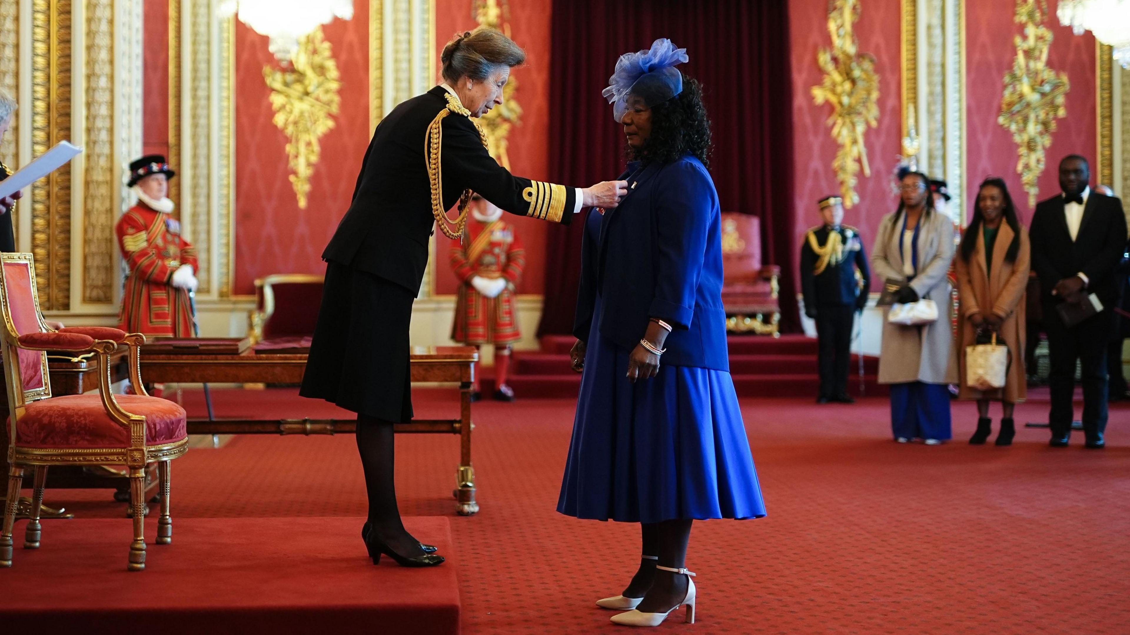 Gee Walker is made a Member of the Order of the British Empire by the Princess Royal at Buckingham Palace