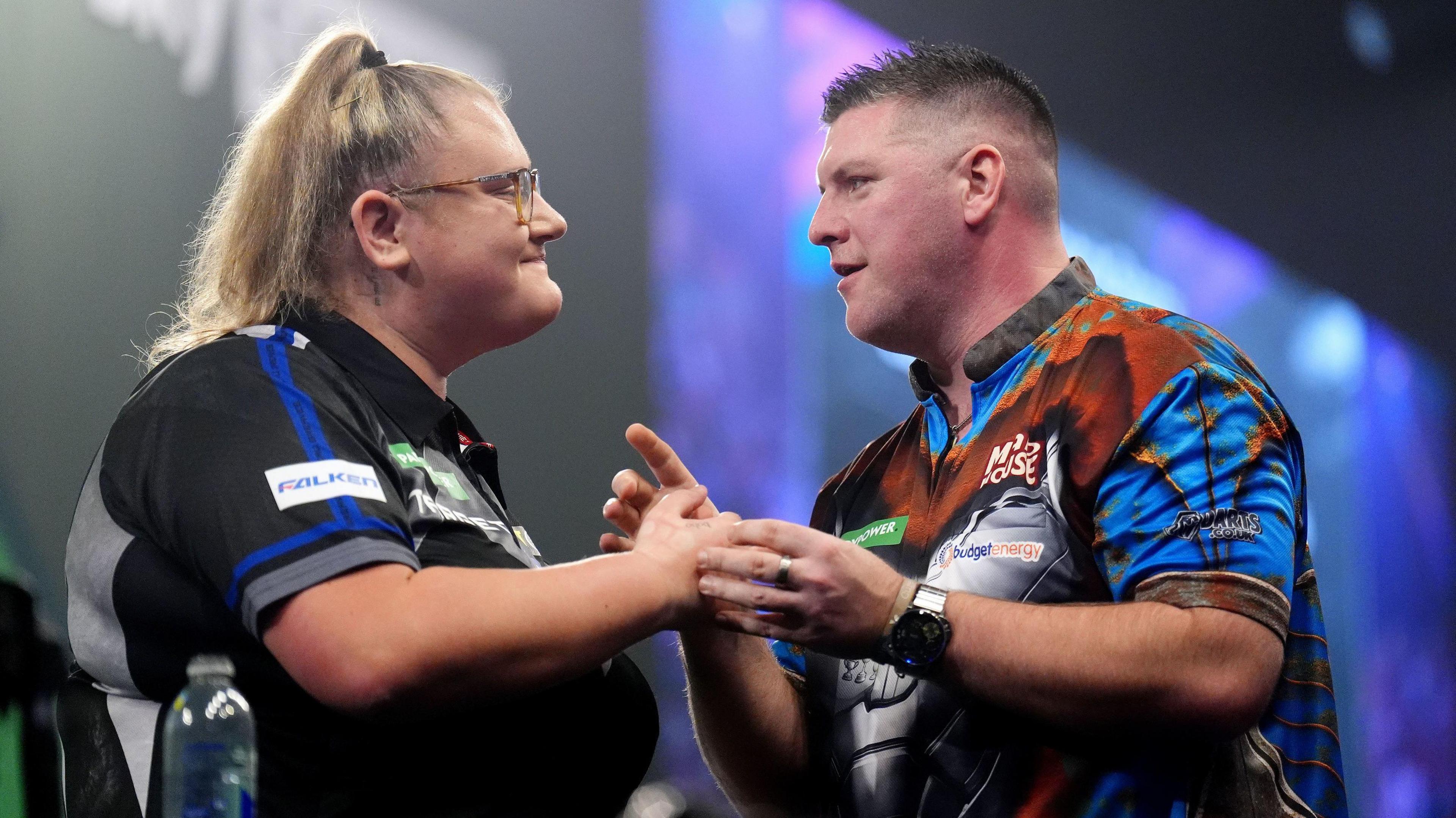 Beau Greaves shakes hands with Daryl Gurney