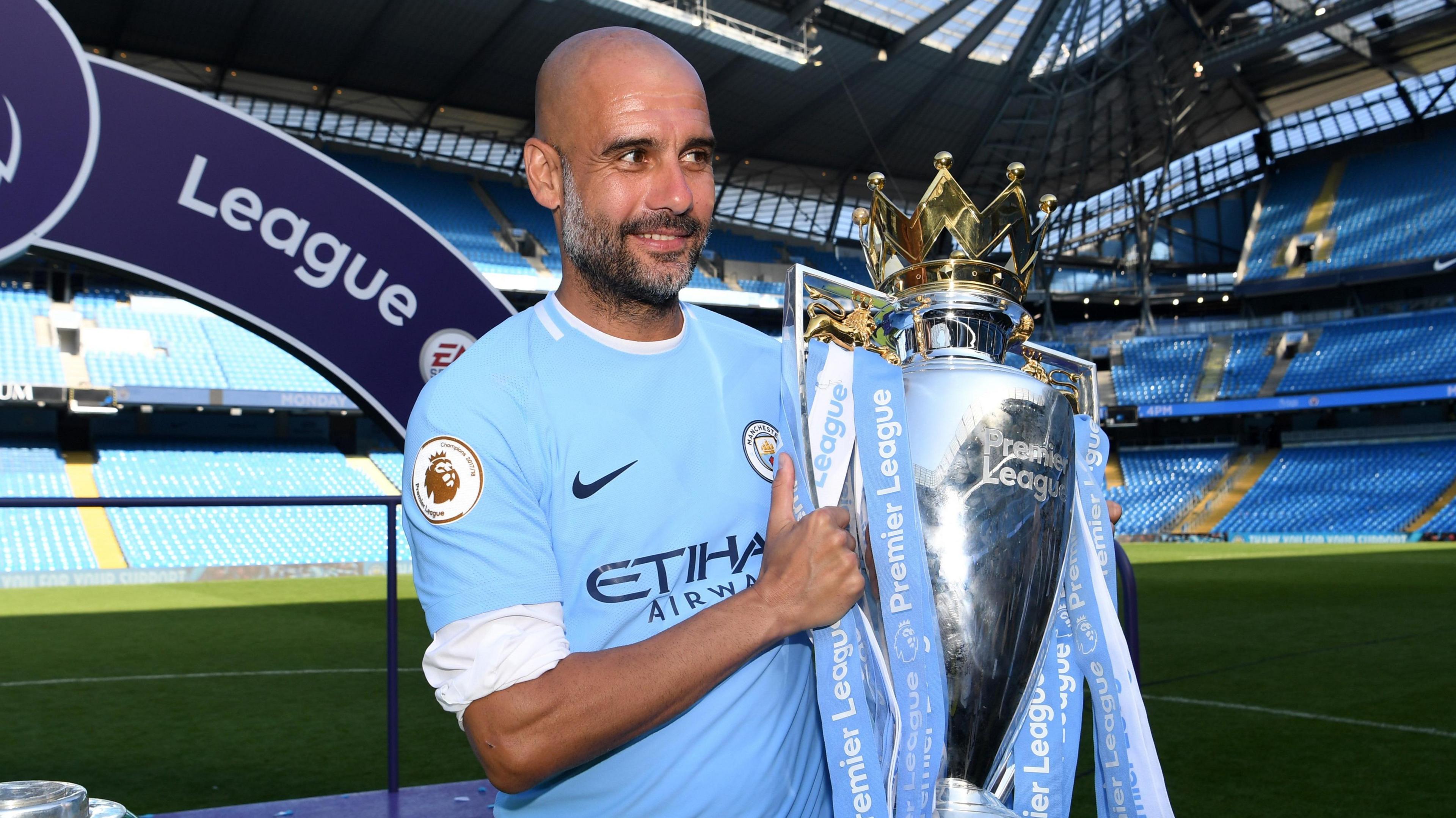 Pep Guardiola with Premier League trophy