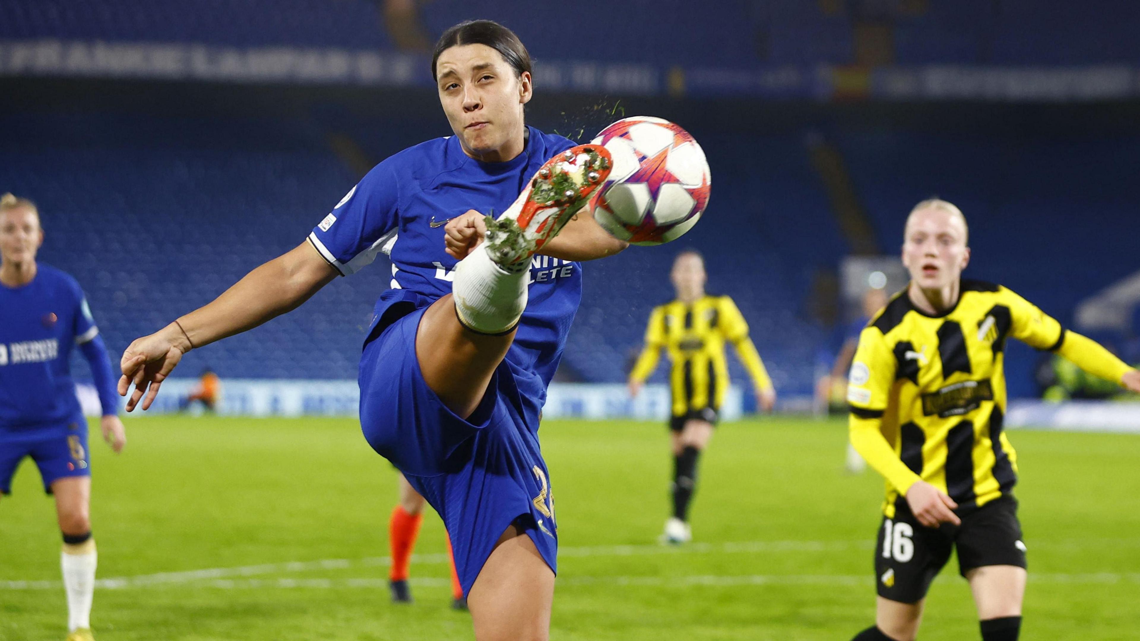 Chelsea's Sam Kerr kicks a football during a Women's Champions League match between Chelsea and BK Hacken.