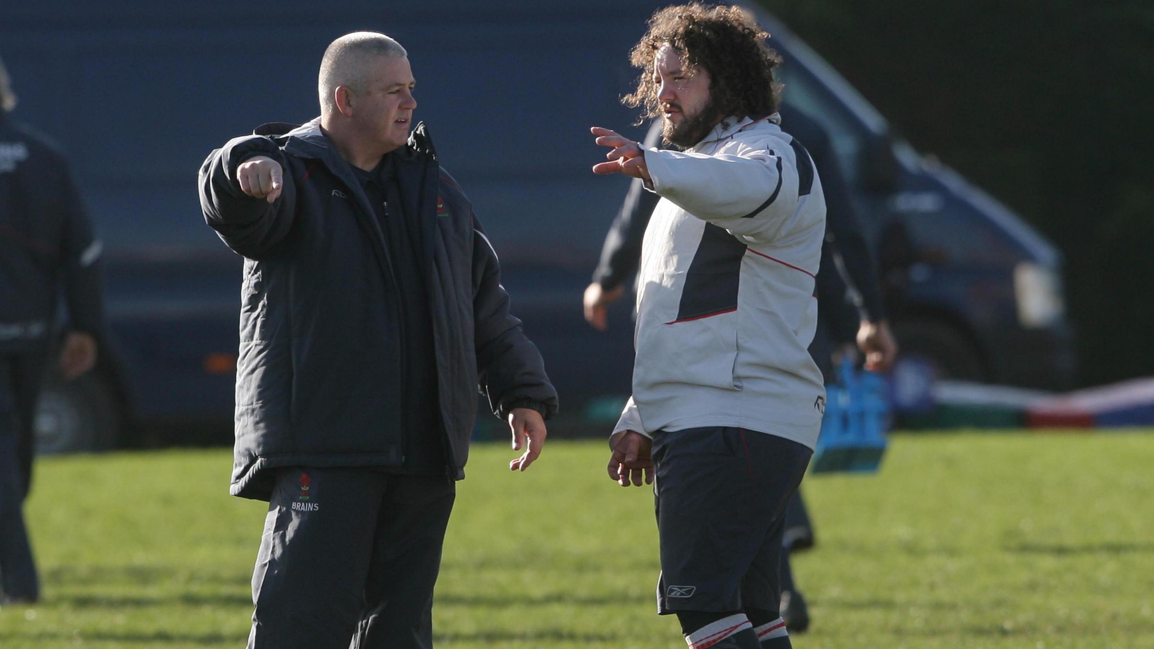 Wales head coach Warren Gatland and Adam Jones in conversation before the trip to face England in 2008