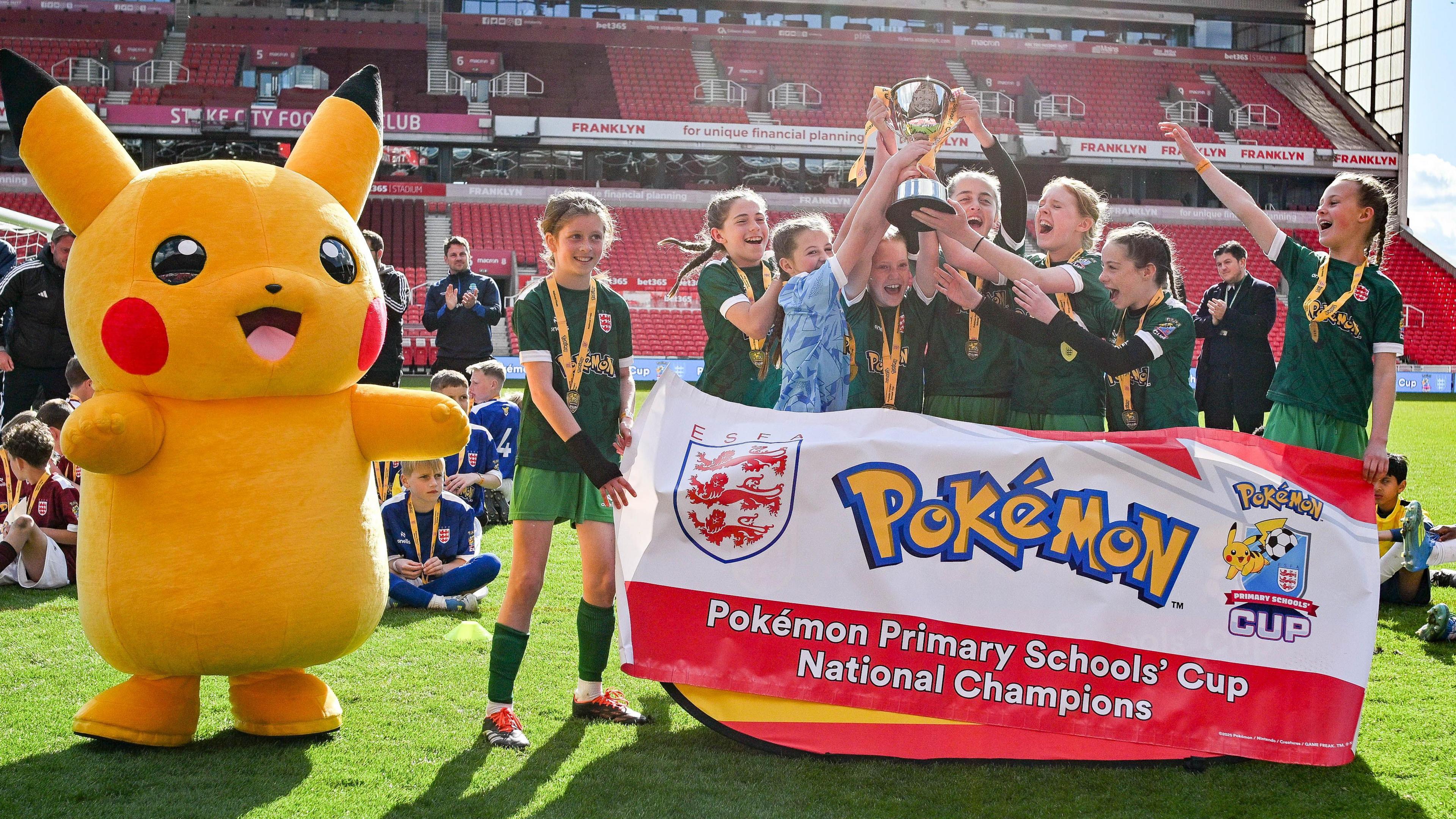 Southborough Primary School lifting the U11 Girls Cup.