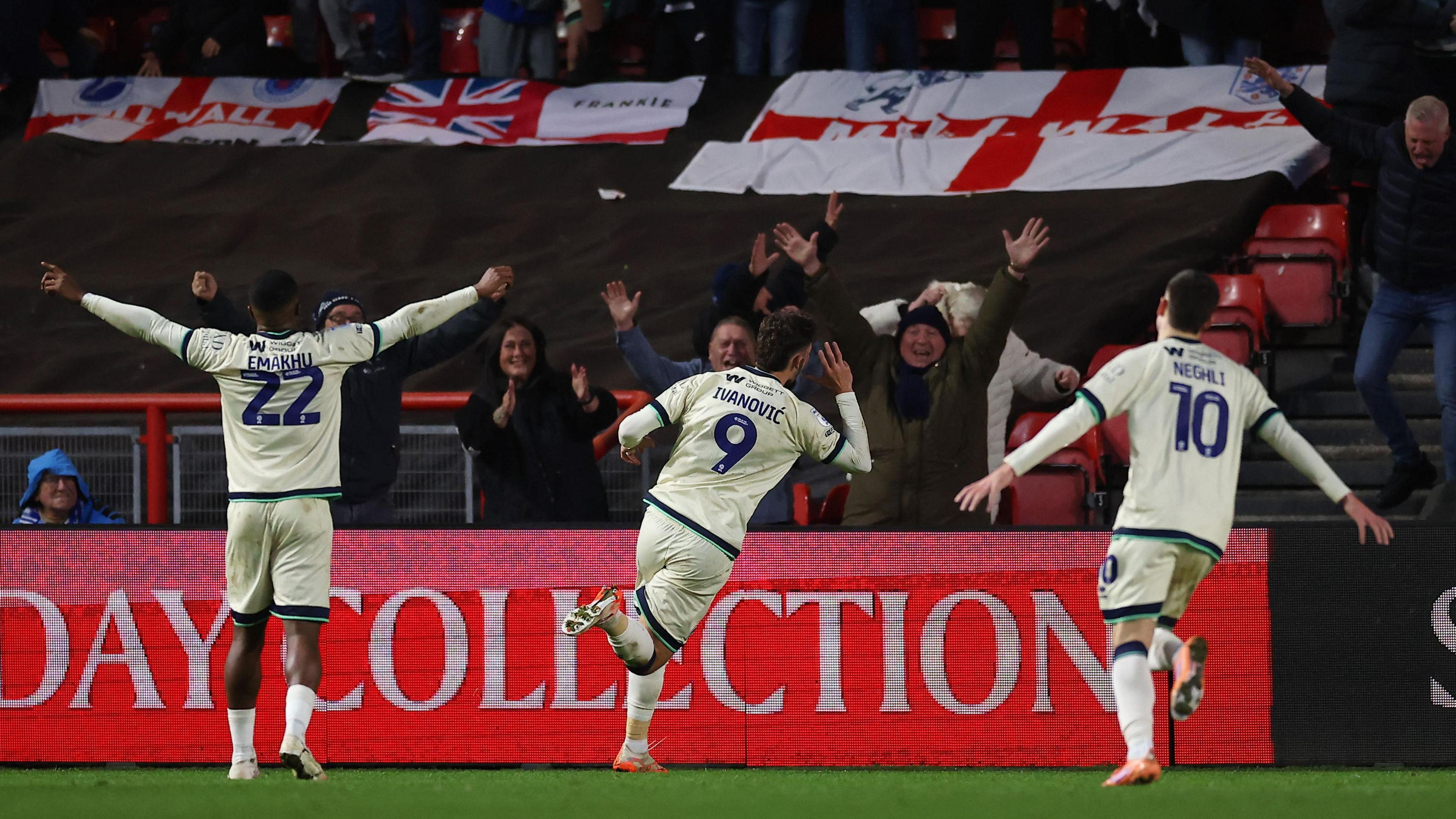 Mihailo Ivanovic runs away in celebration towards the Millwall fans after scoring his fourth goal of the season