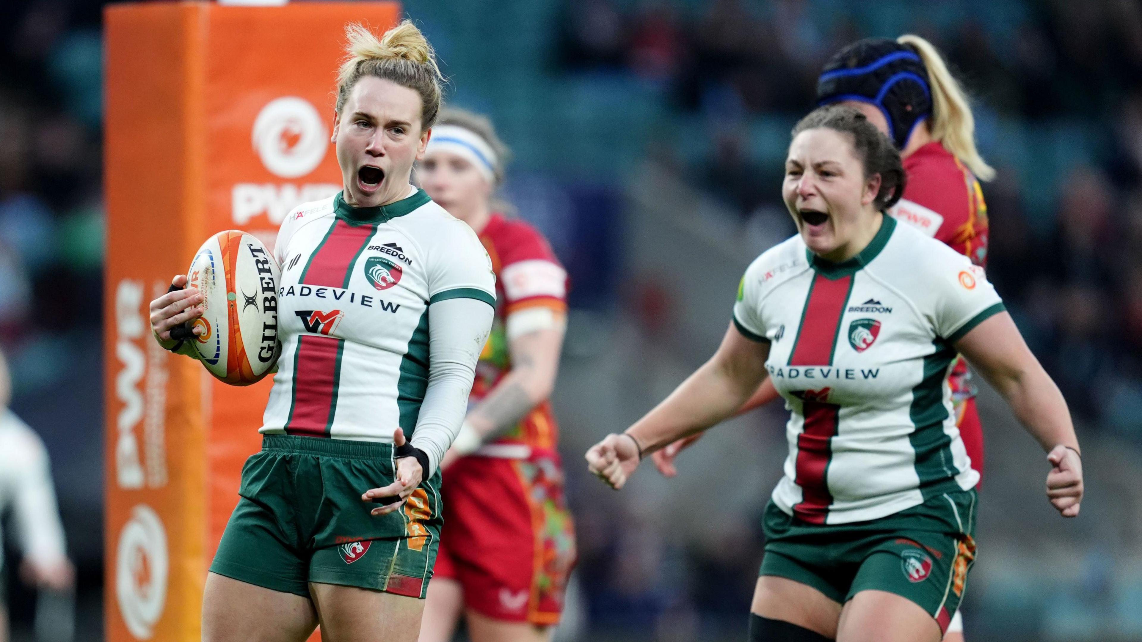 Meg Jones (left) celebrates after scoring Leicester's first try against Harlequins